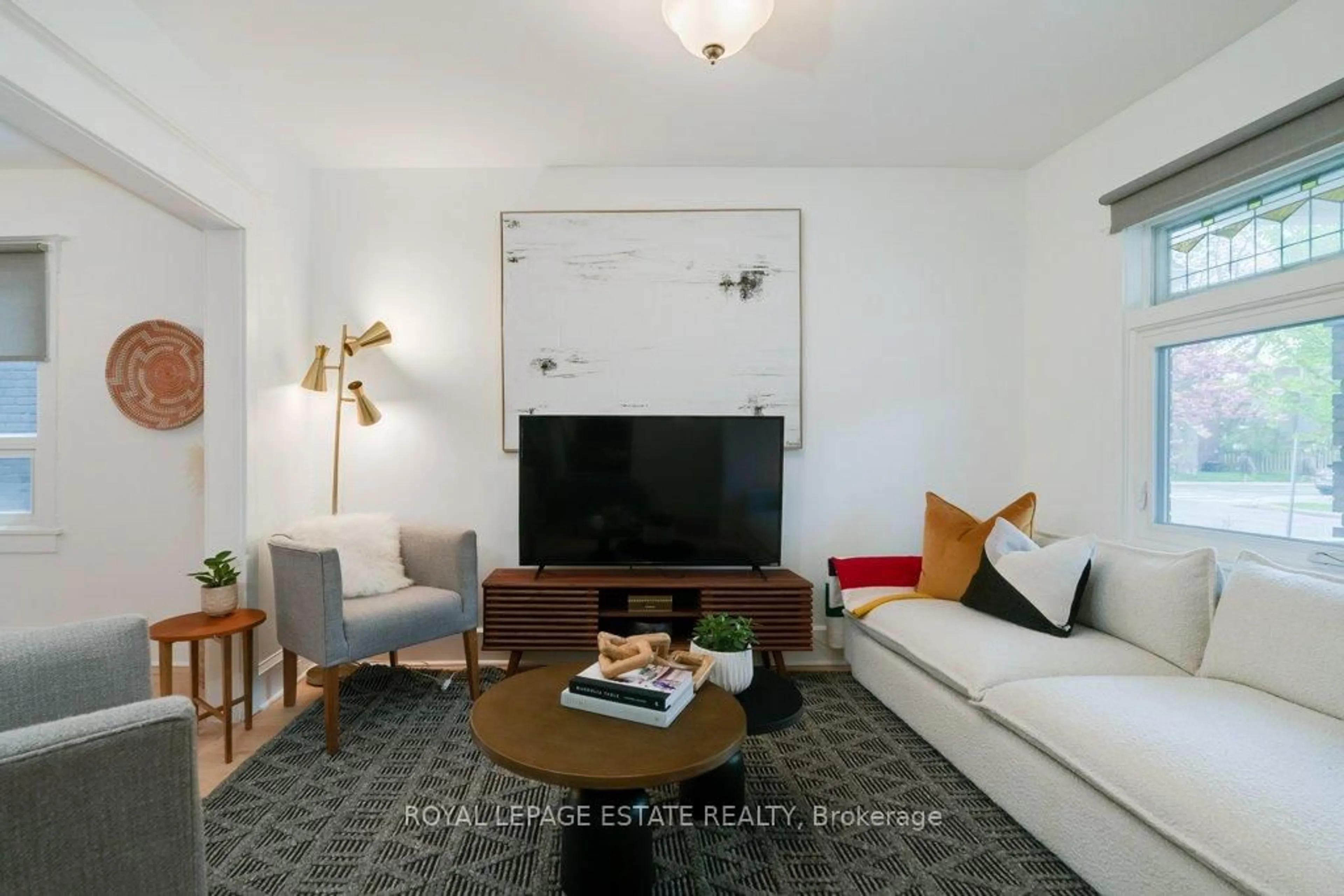 Living room with furniture, unknown for 923 Greenwood Ave, Toronto Ontario M4J 4C2