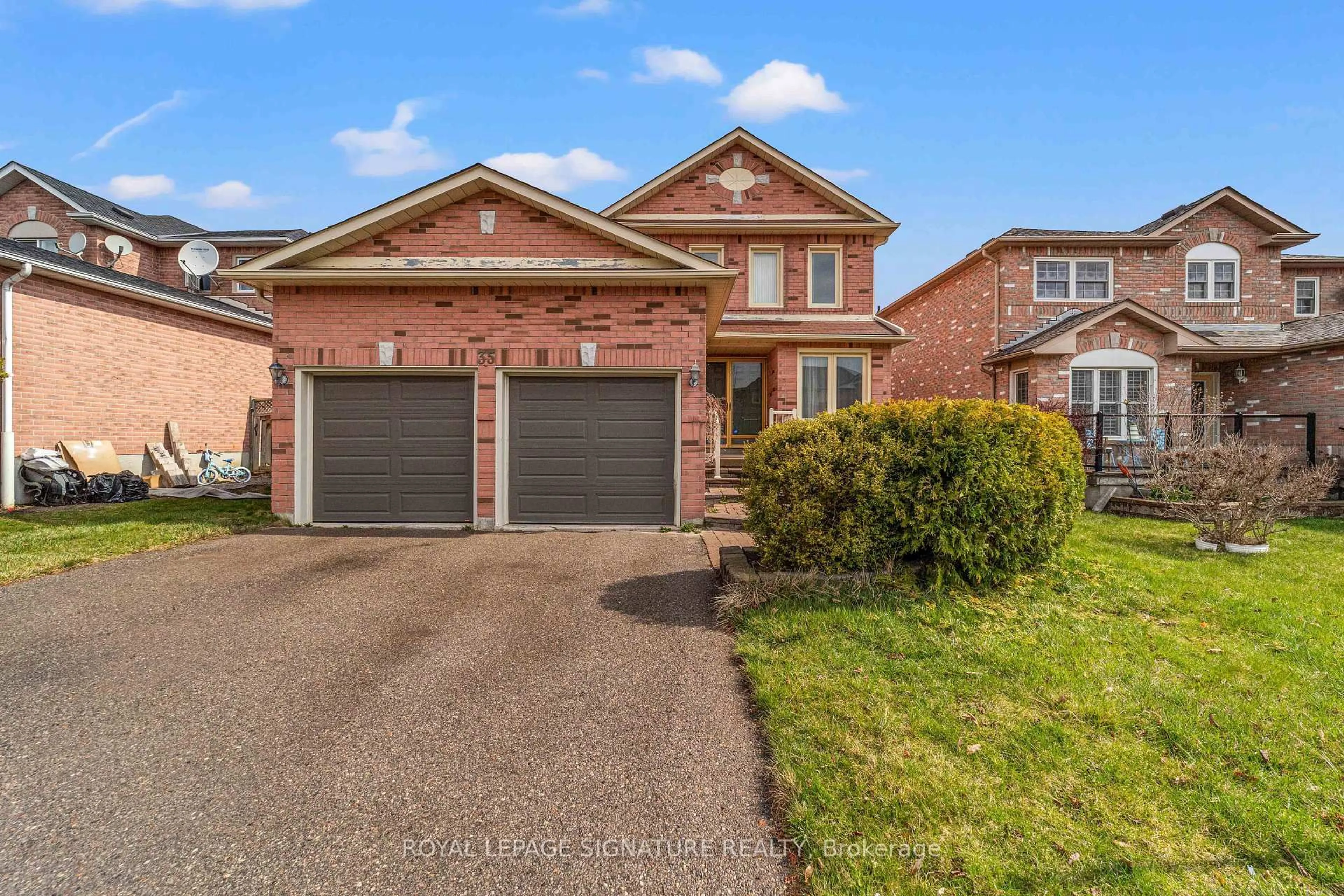 Home with brick exterior material, street for 35 Valleywood Dr, Whitby Ontario L1R 2J6