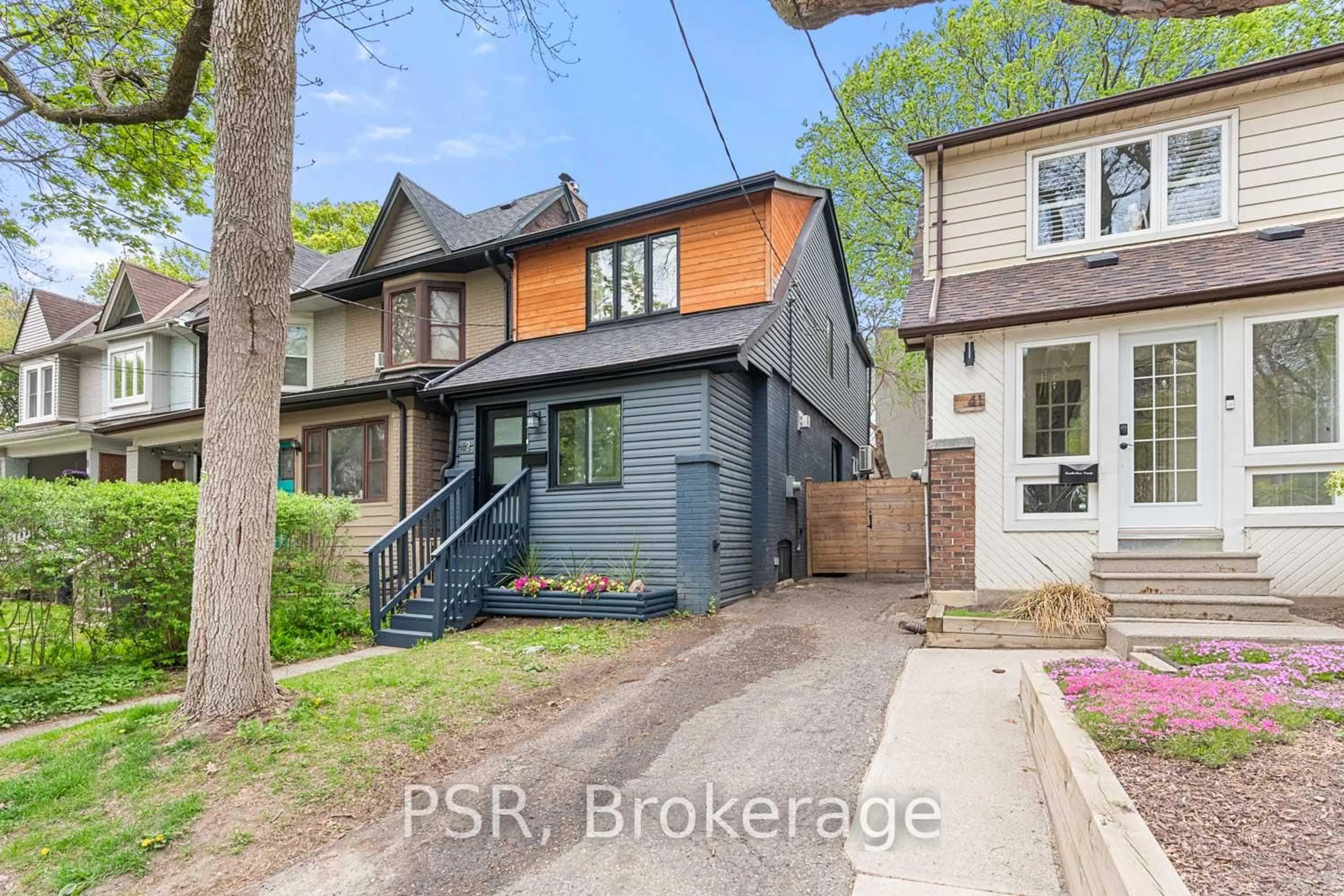 Home with brick exterior material, street for 43 Hemlock Ave, Toronto Ontario M4L 3E9
