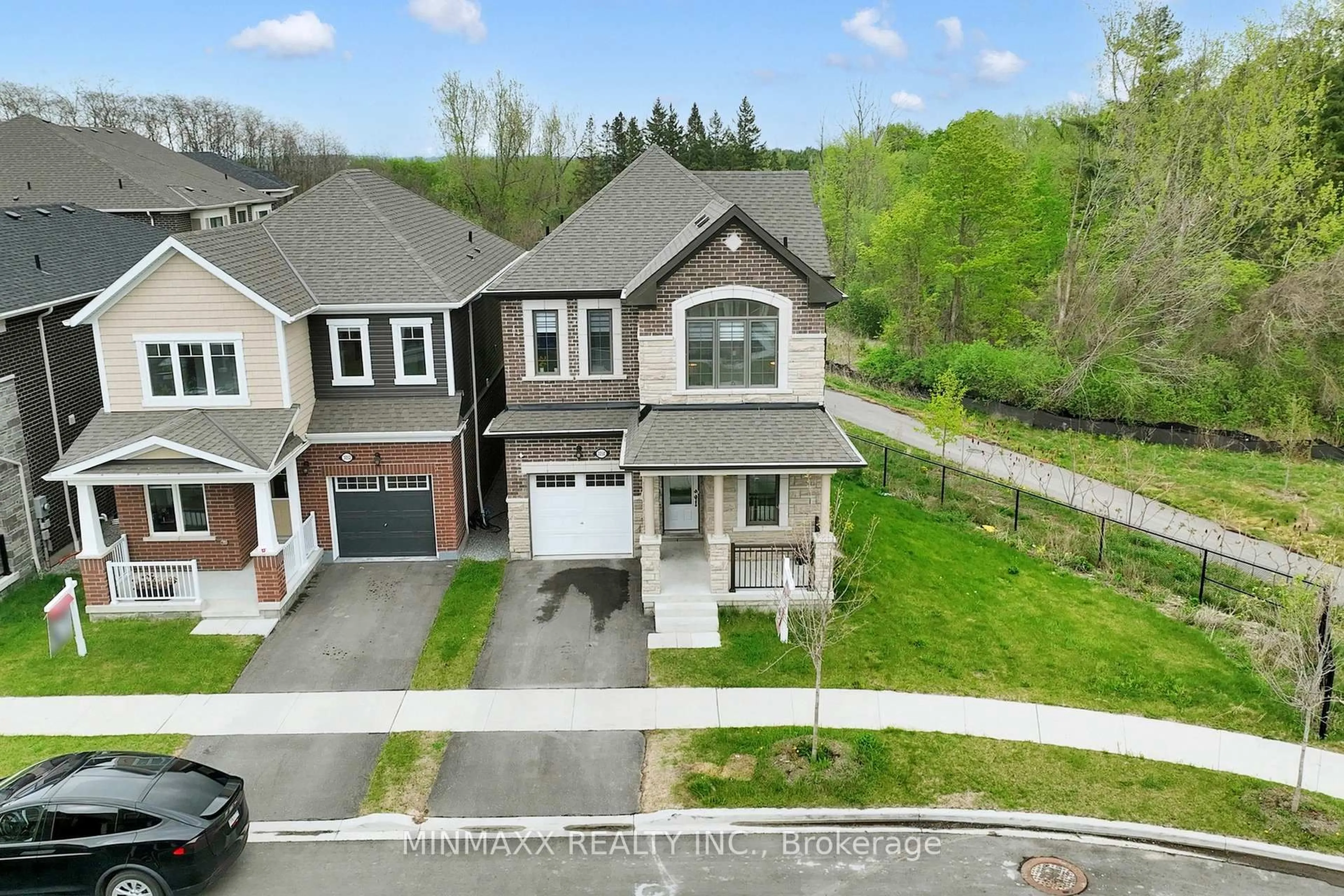 A pic from outside/outdoor area/front of a property/back of a property/a pic from drone, street for 3050 Hollyberry Tr, Pickering Ontario L1X 0N5