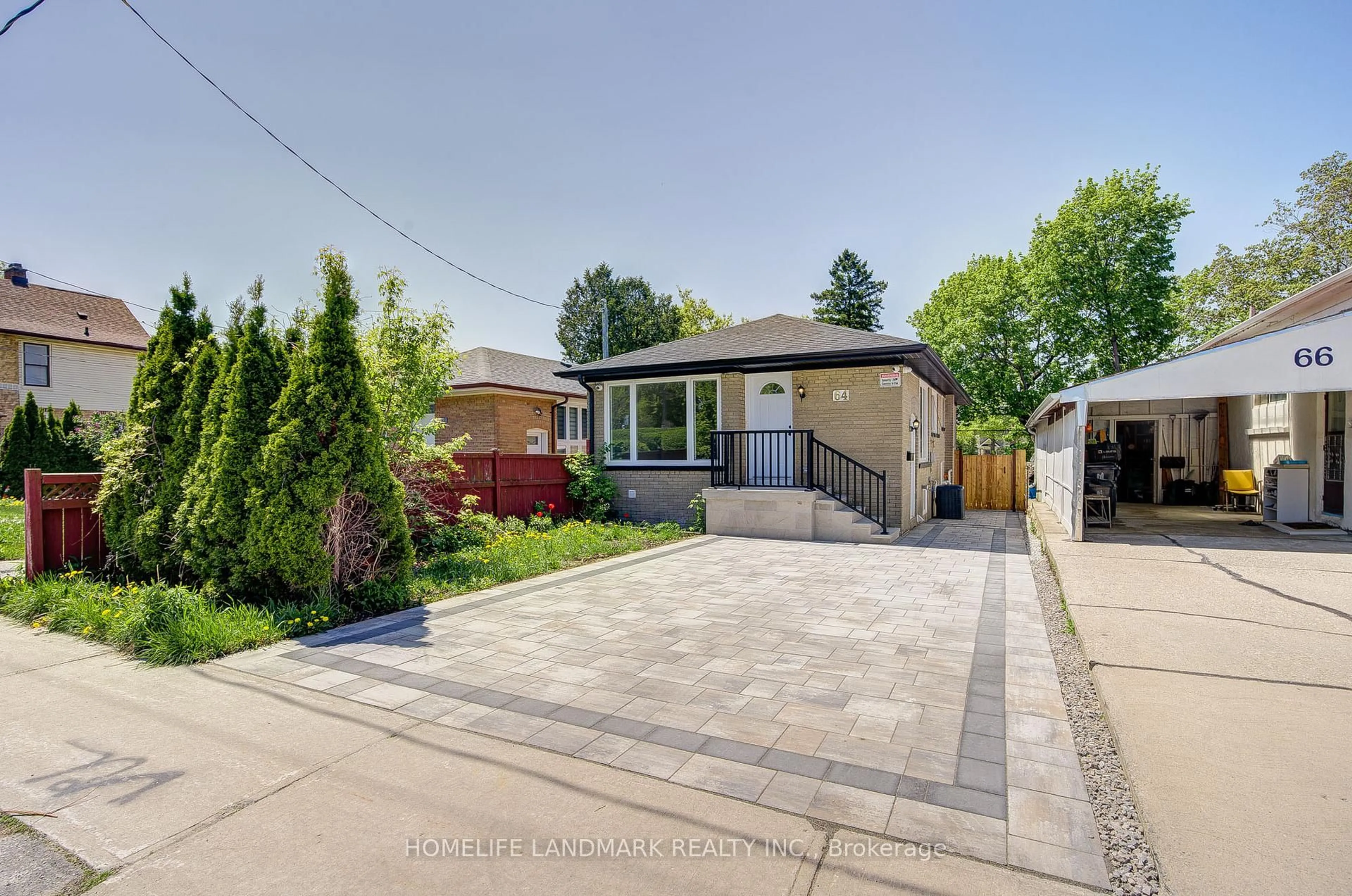 A pic from outside/outdoor area/front of a property/back of a property/a pic from drone, street for 64 Laurel Ave, Toronto Ontario M1K 3J6