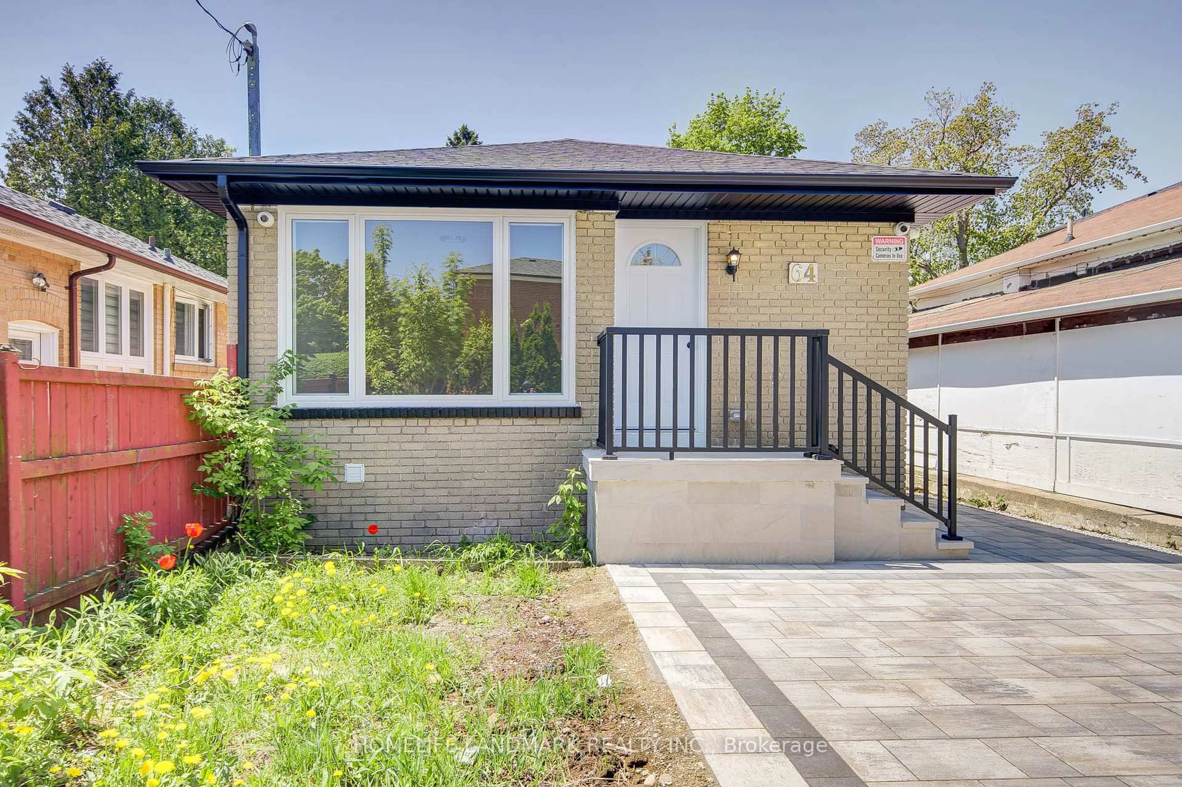 Home with brick exterior material, street for 64 Laurel Ave, Toronto Ontario M1K 3J6