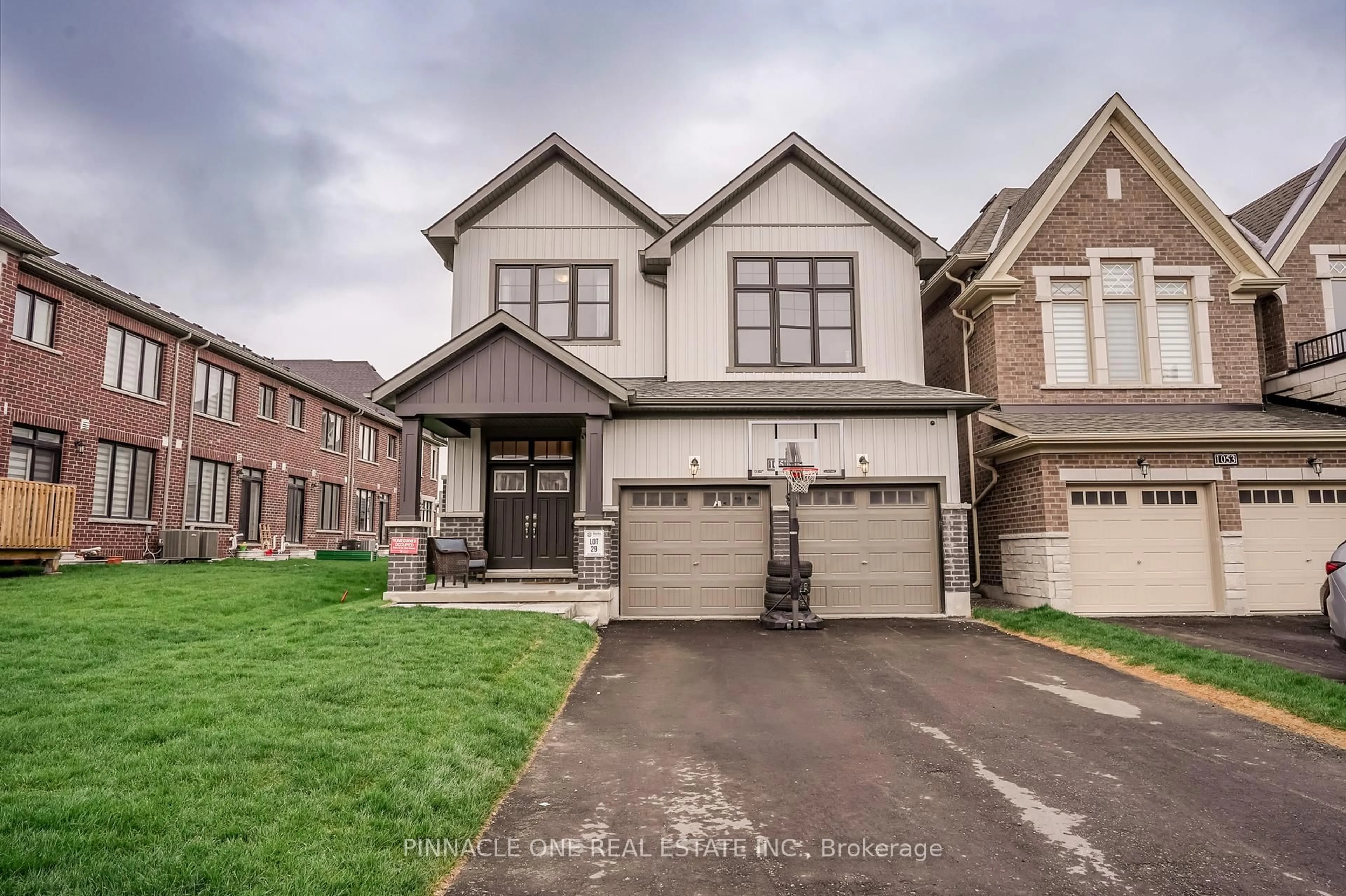 Home with brick exterior material, street for 1057 Suddard Ave, Oshawa Ontario L1L 0V5