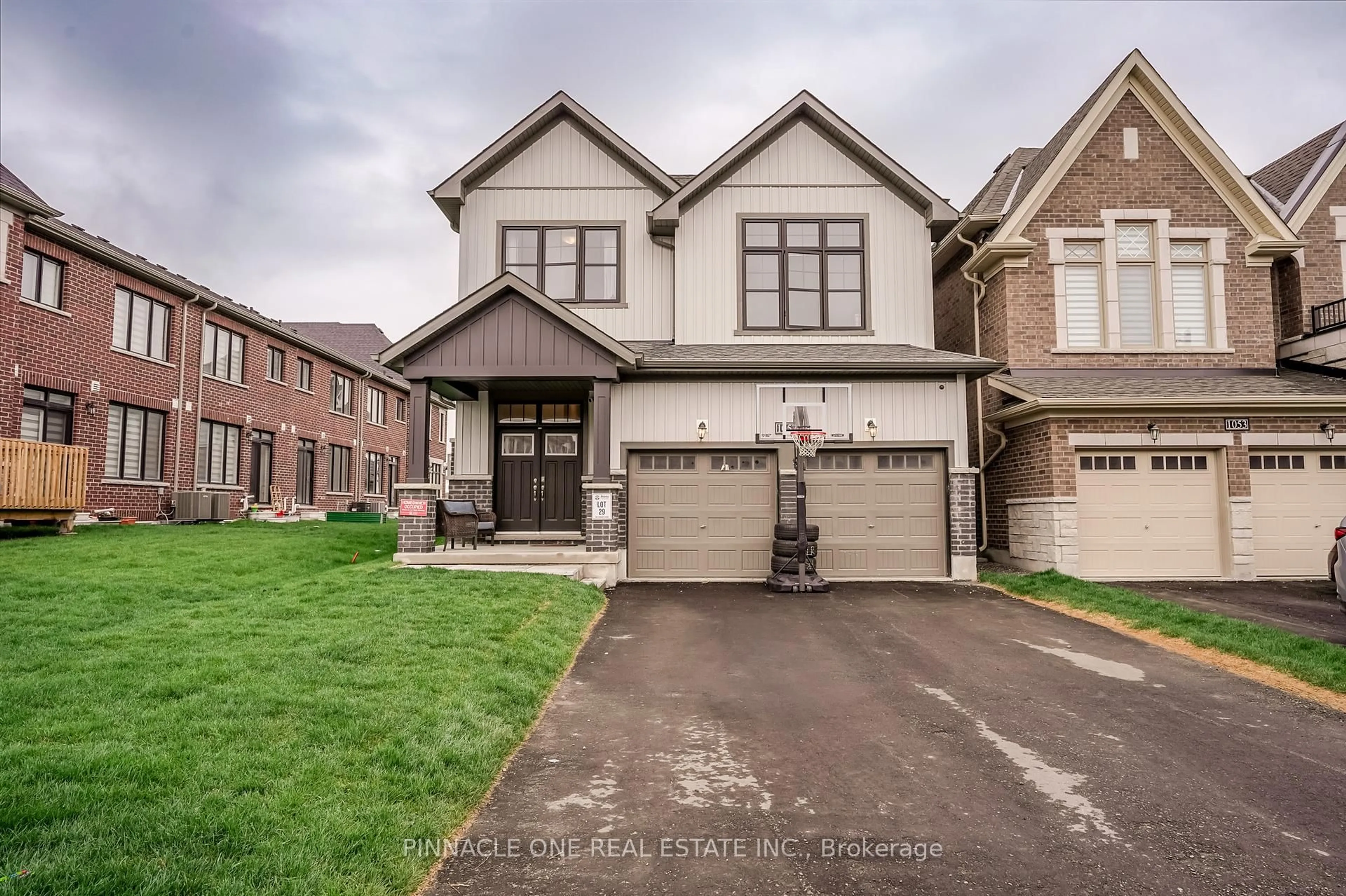 Home with brick exterior material, street for 1057 Suddard Ave, Oshawa Ontario L1L 0V5