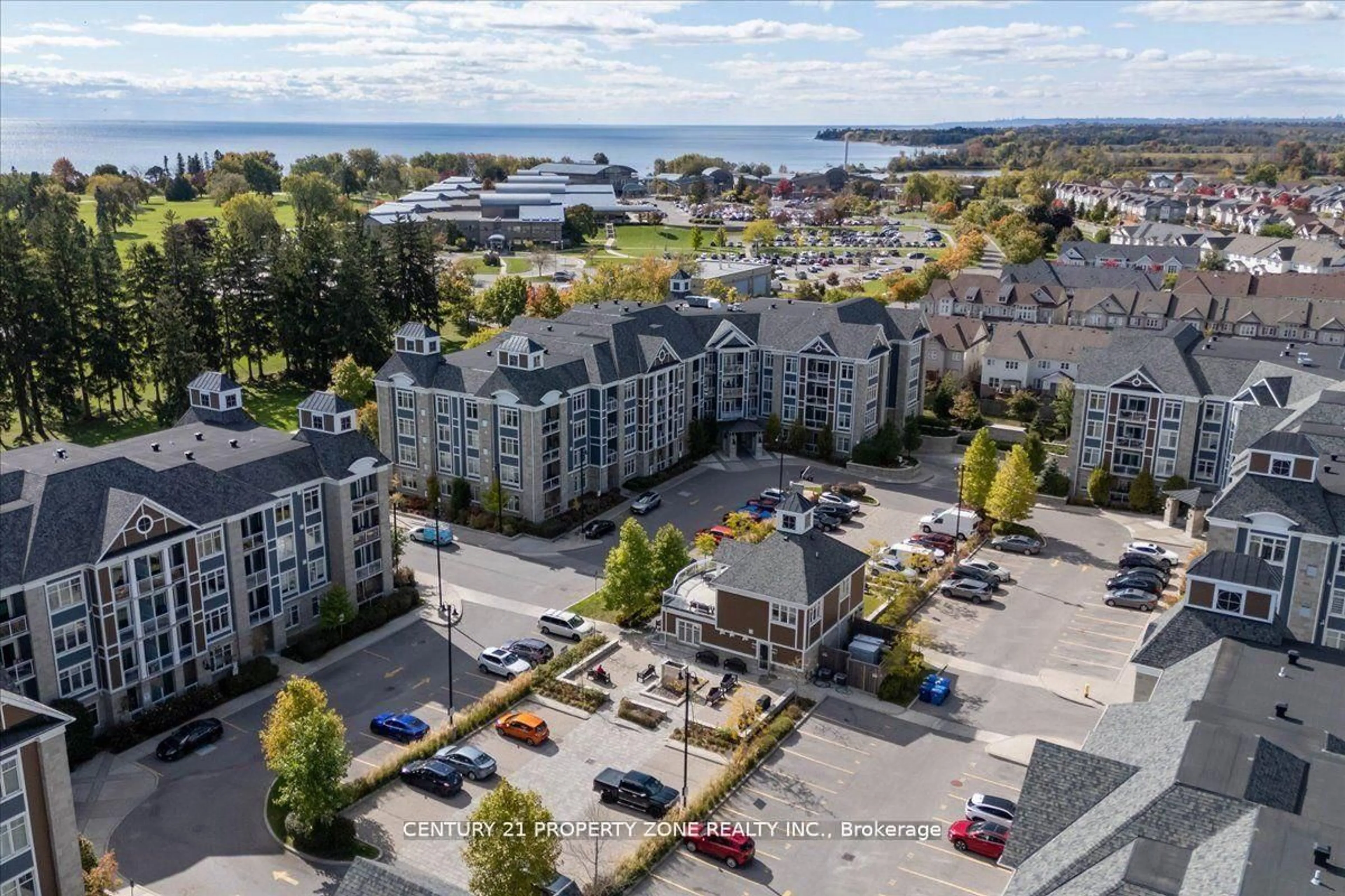 A pic from outside/outdoor area/front of a property/back of a property/a pic from drone, city buildings view from balcony for 650 Gordon St #303, Whitby Ontario L1N 0C1