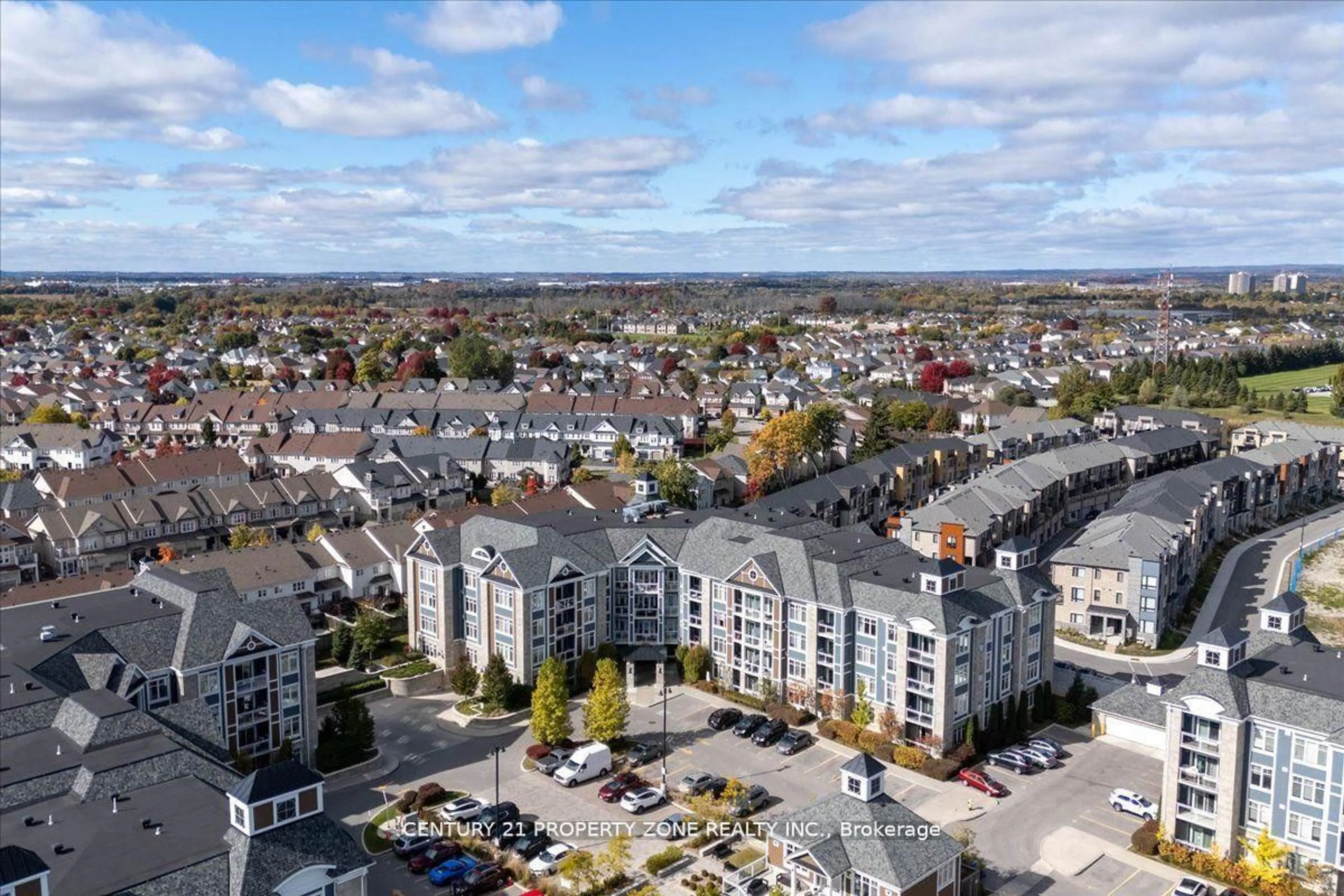 A pic from outside/outdoor area/front of a property/back of a property/a pic from drone, city buildings view from balcony for 650 Gordon St #303, Whitby Ontario L1N 0C1