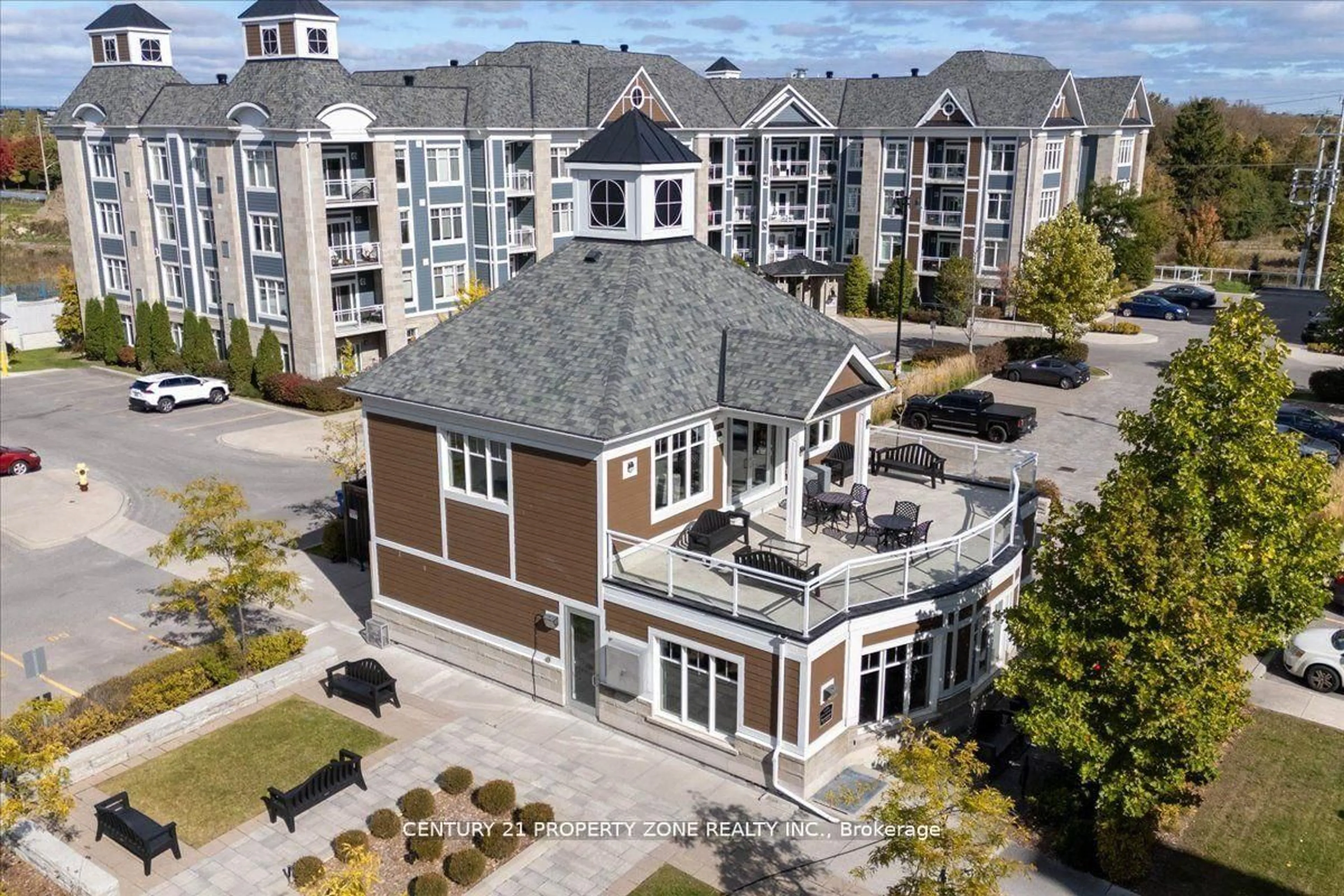 A pic from outside/outdoor area/front of a property/back of a property/a pic from drone, unknown for 650 Gordon St #303, Whitby Ontario L1N 0C1