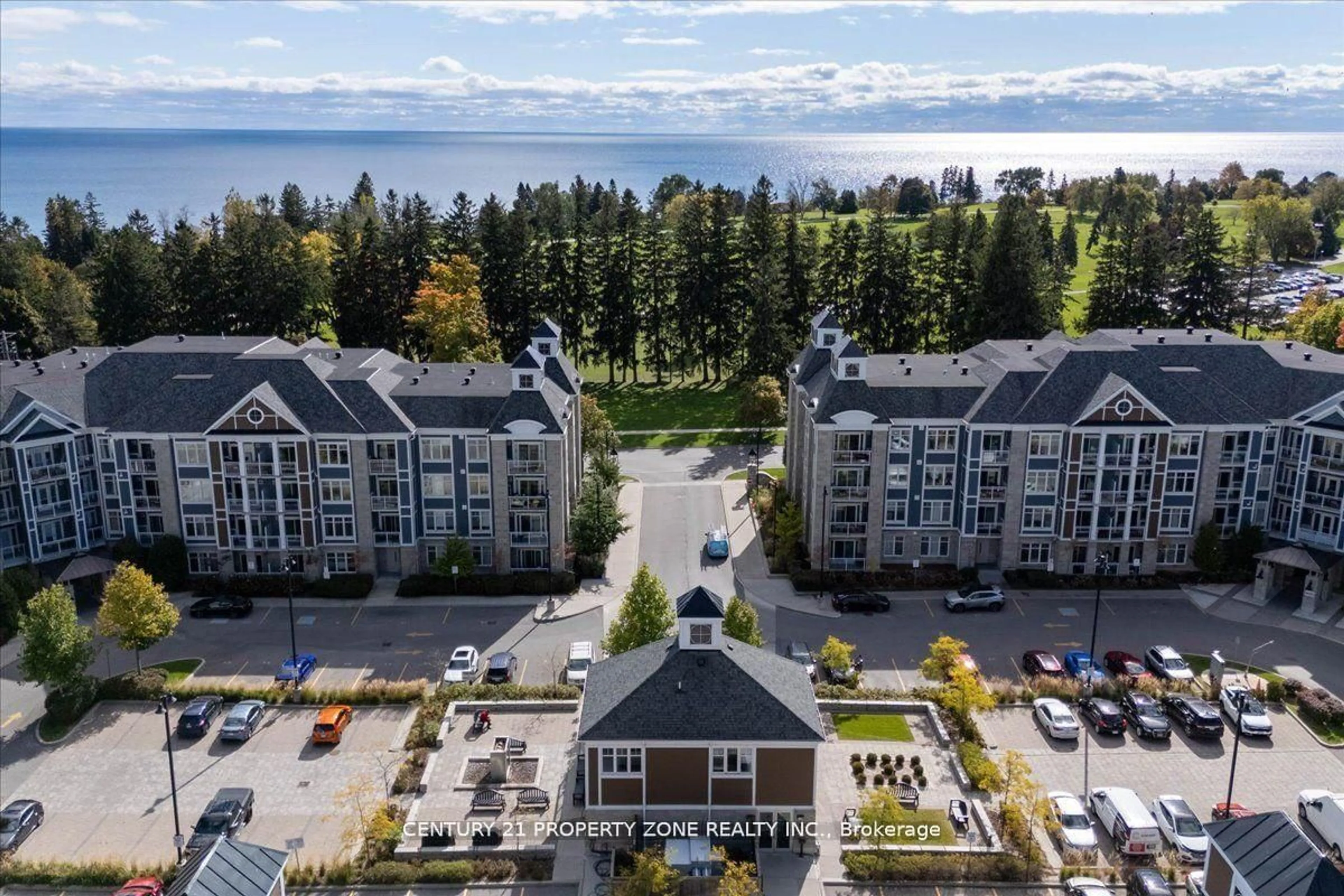 A pic from outside/outdoor area/front of a property/back of a property/a pic from drone, water/lake/river/ocean view for 650 Gordon St #303, Whitby Ontario L1N 0C1