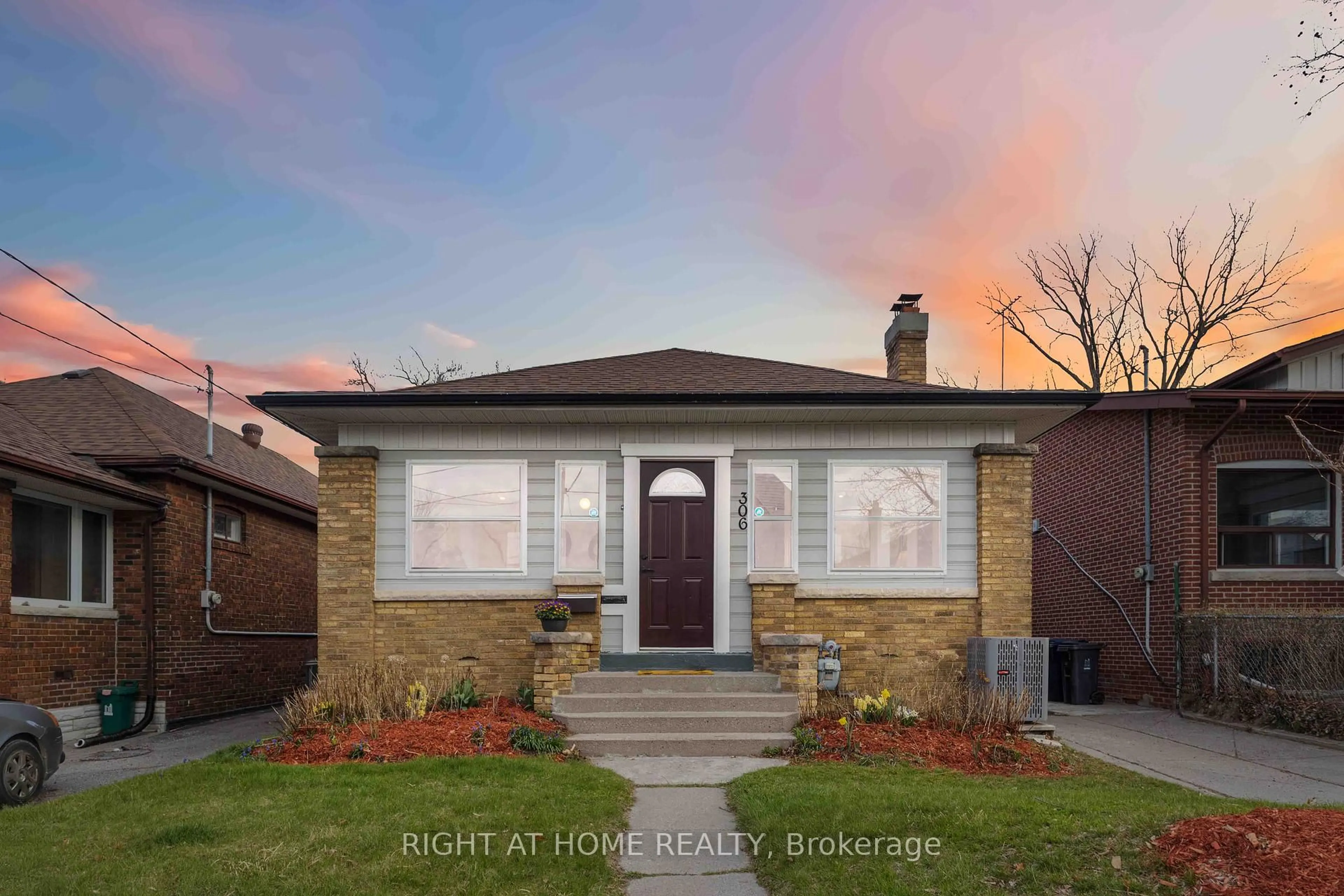Home with brick exterior material, street for 306 Strathmore Blvd, Toronto Ontario M4J 1P8