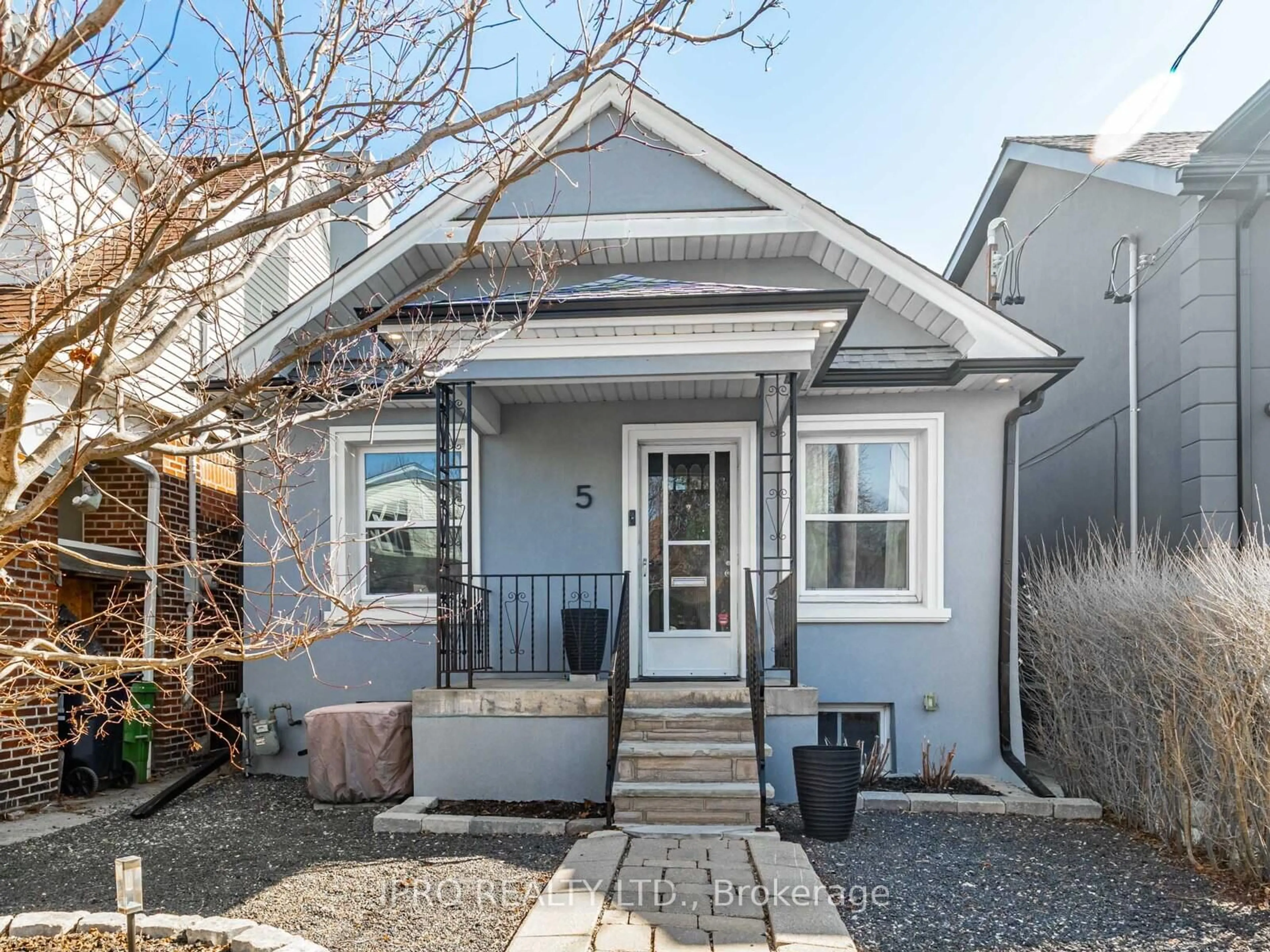 Home with vinyl exterior material, street for 5 Thyra Ave, Toronto Ontario M4C 5G4