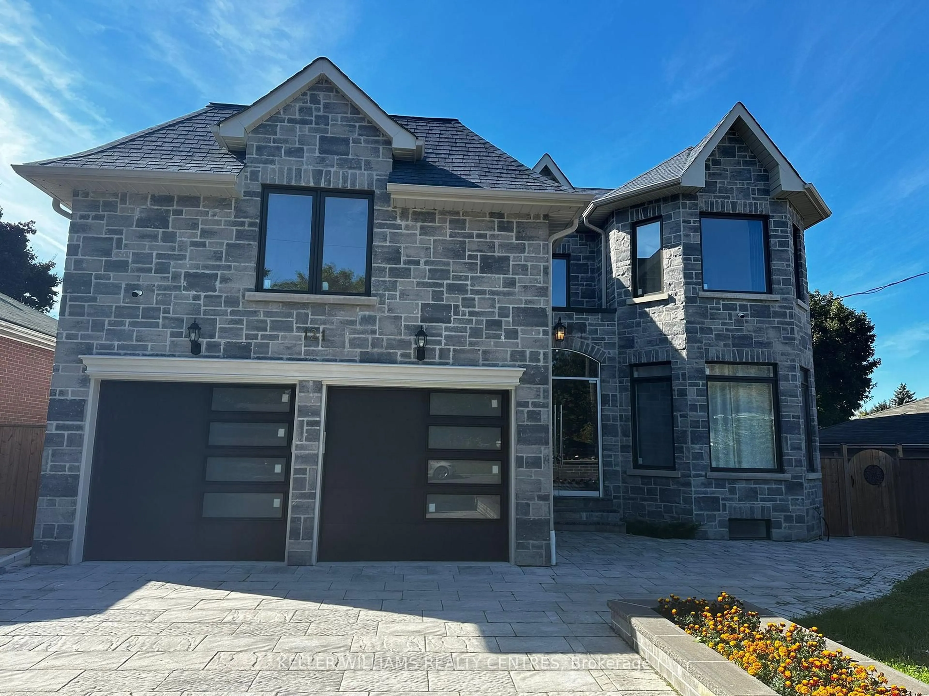 Home with brick exterior material, street for 121 Earlton Rd, Toronto Ontario M1T 2R8