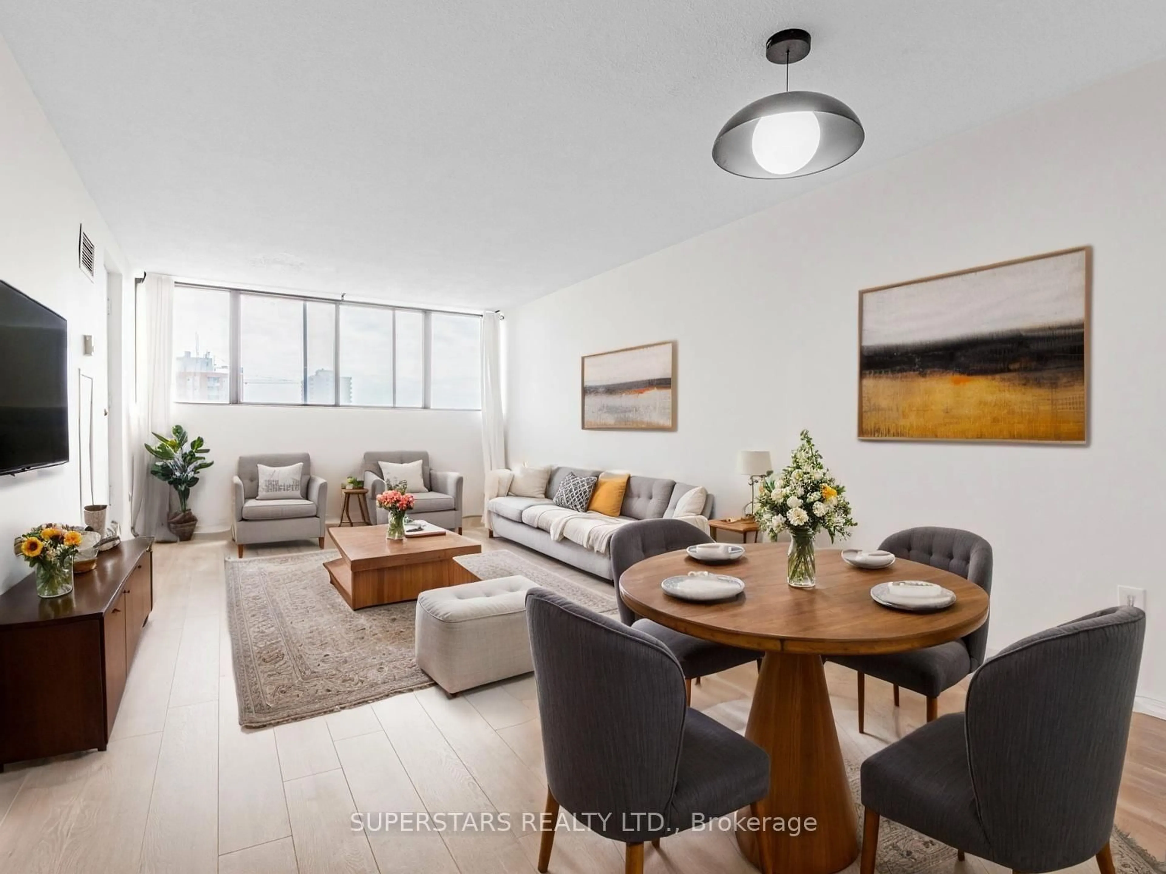 Living room with furniture, wood/laminate floor for 99 Blackwell Ave #813, Toronto Ontario M1B 3R5