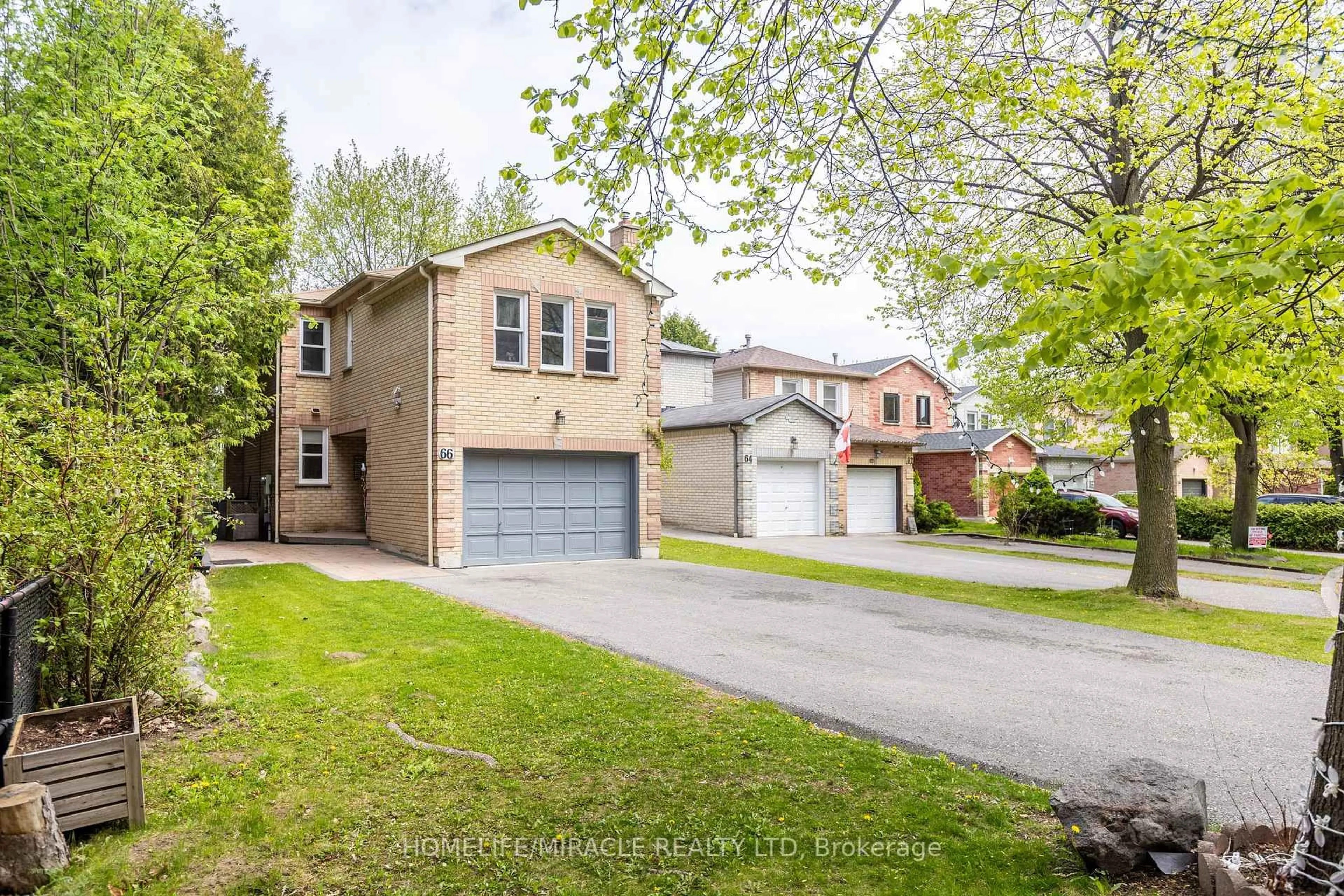 Home with brick exterior material, street for 66 Teddington Cres, Whitby Ontario L1R 1S3