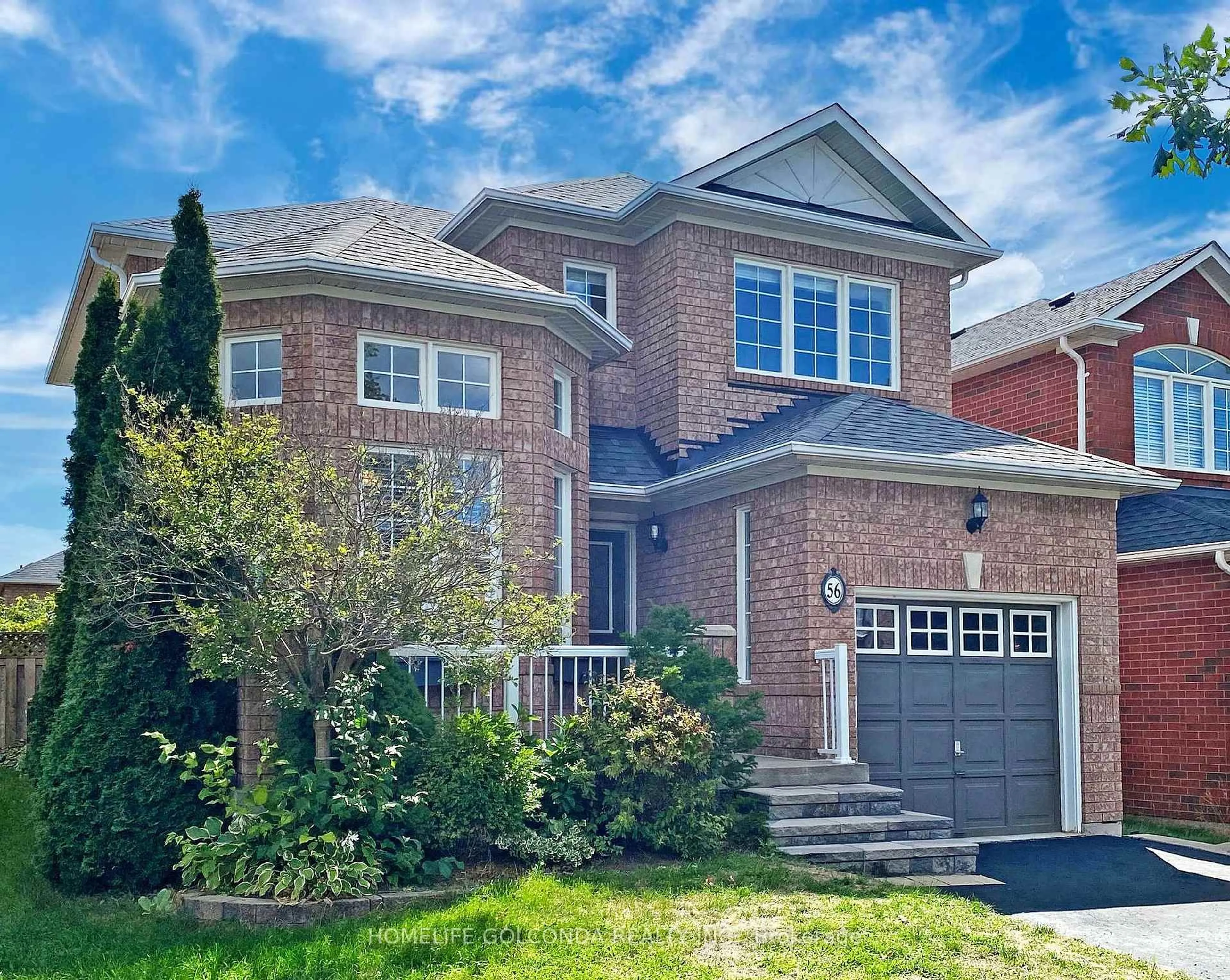 Home with brick exterior material, street for 56 Lurosa Cres, Whitby Ontario L1R 3A9