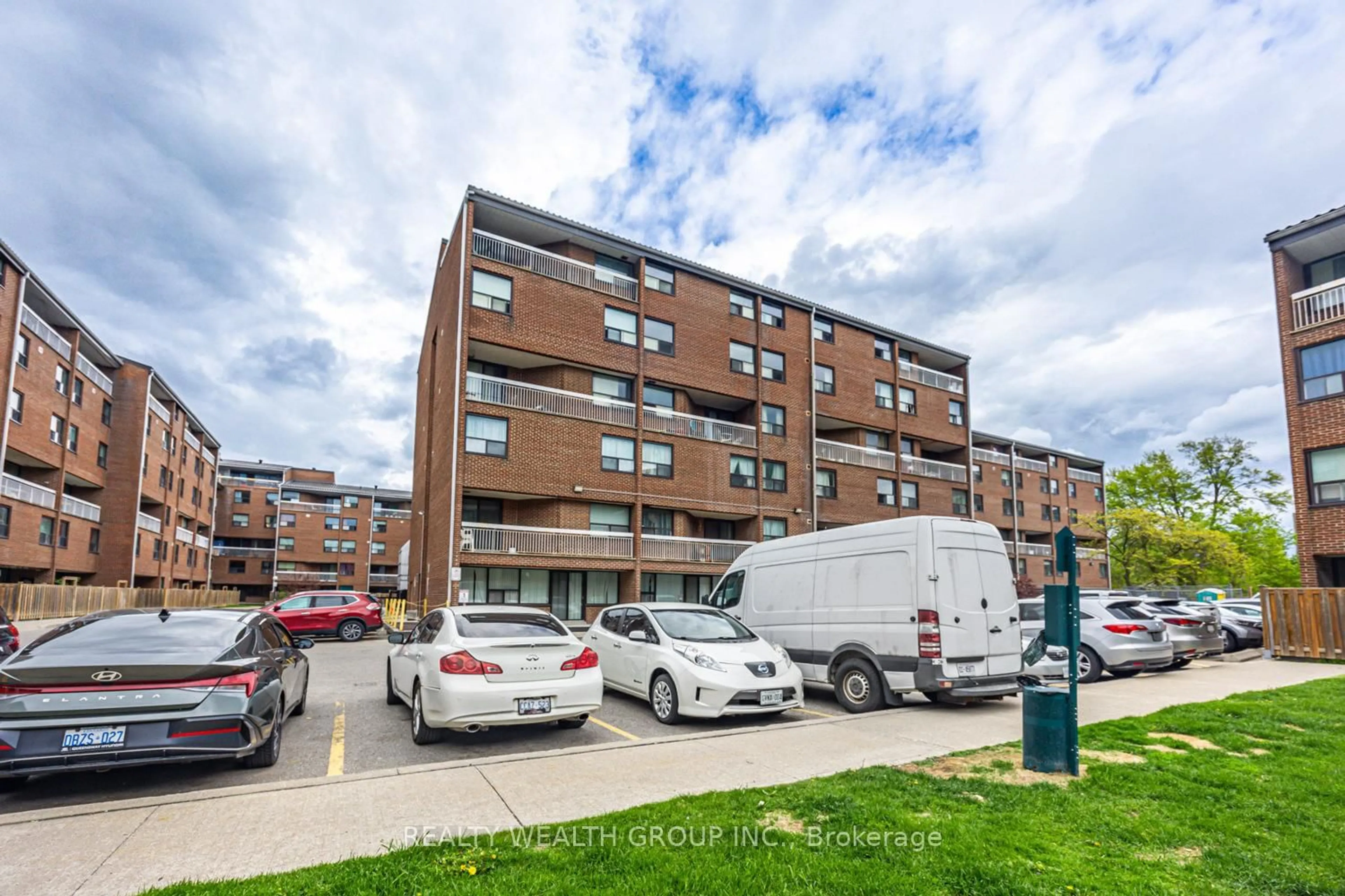 A pic from outside/outdoor area/front of a property/back of a property/a pic from drone, street for 4062 Lawrence Ave #306, Toronto Ontario M1E 4V5