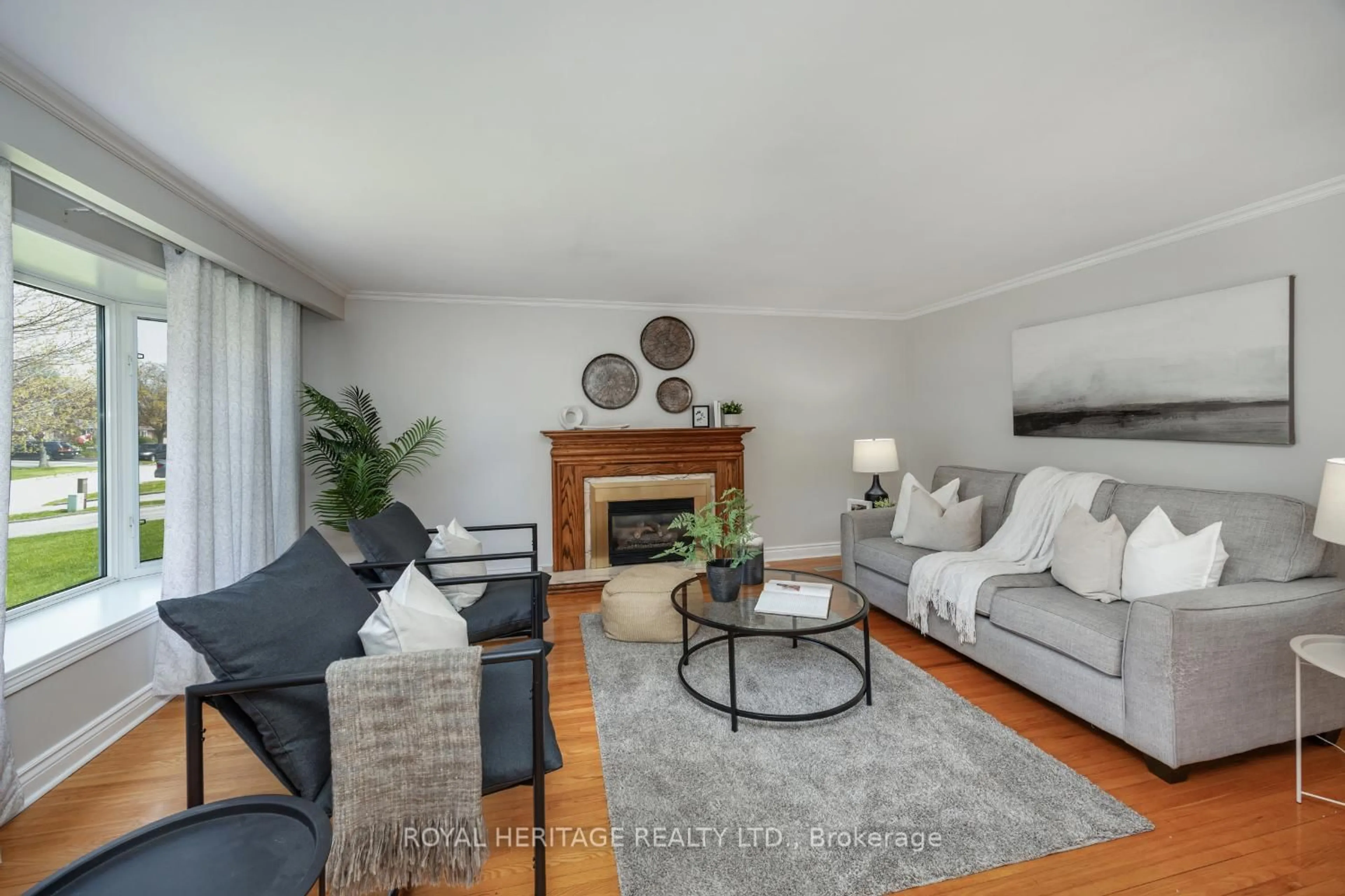 Living room with furniture, wood/laminate floor for 15 Lawrie Rd, Ajax Ontario L1S 3A1