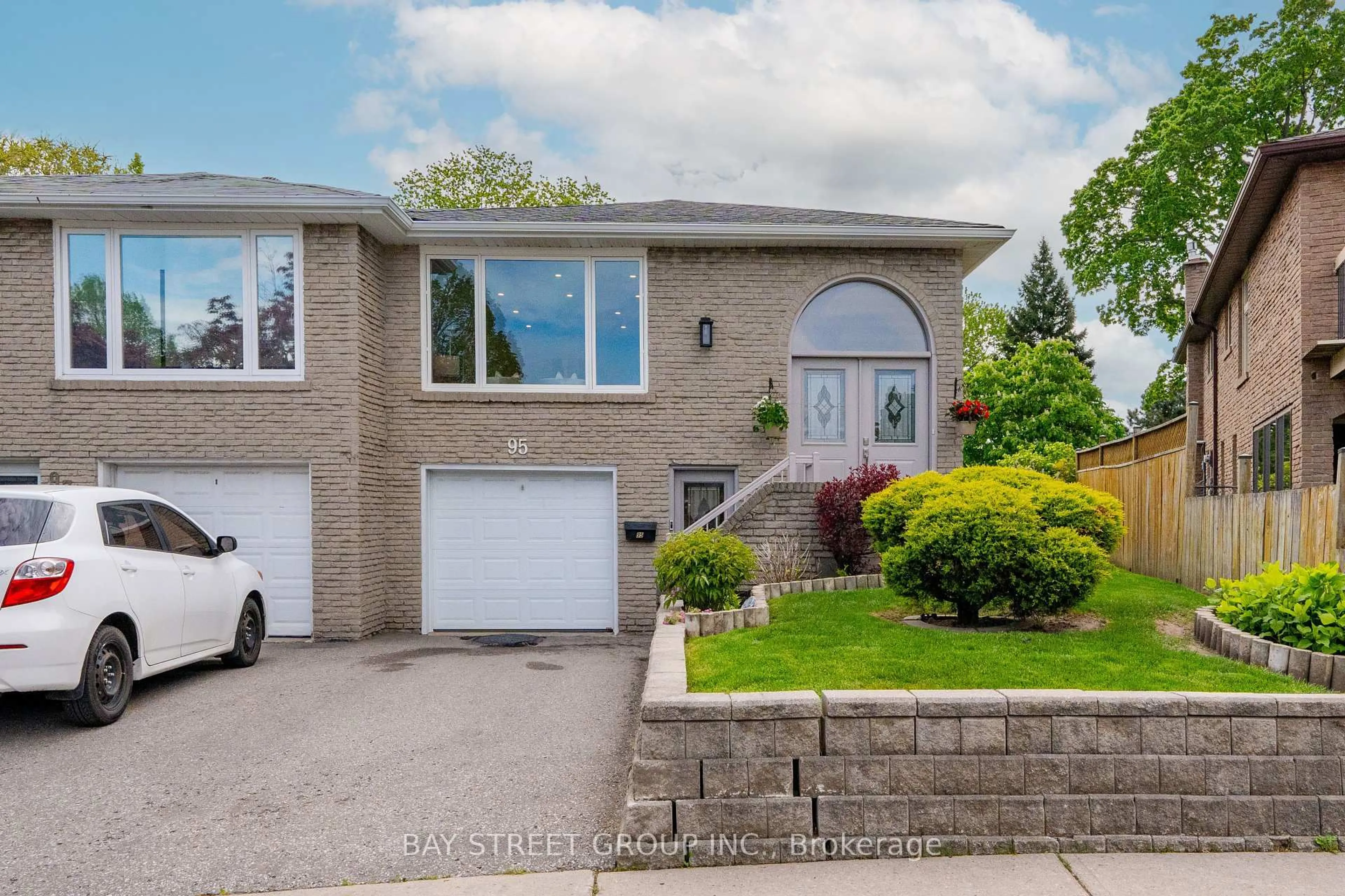 Home with brick exterior material, street for 95 Heaslip Terr, Toronto Ontario M1T 1W8