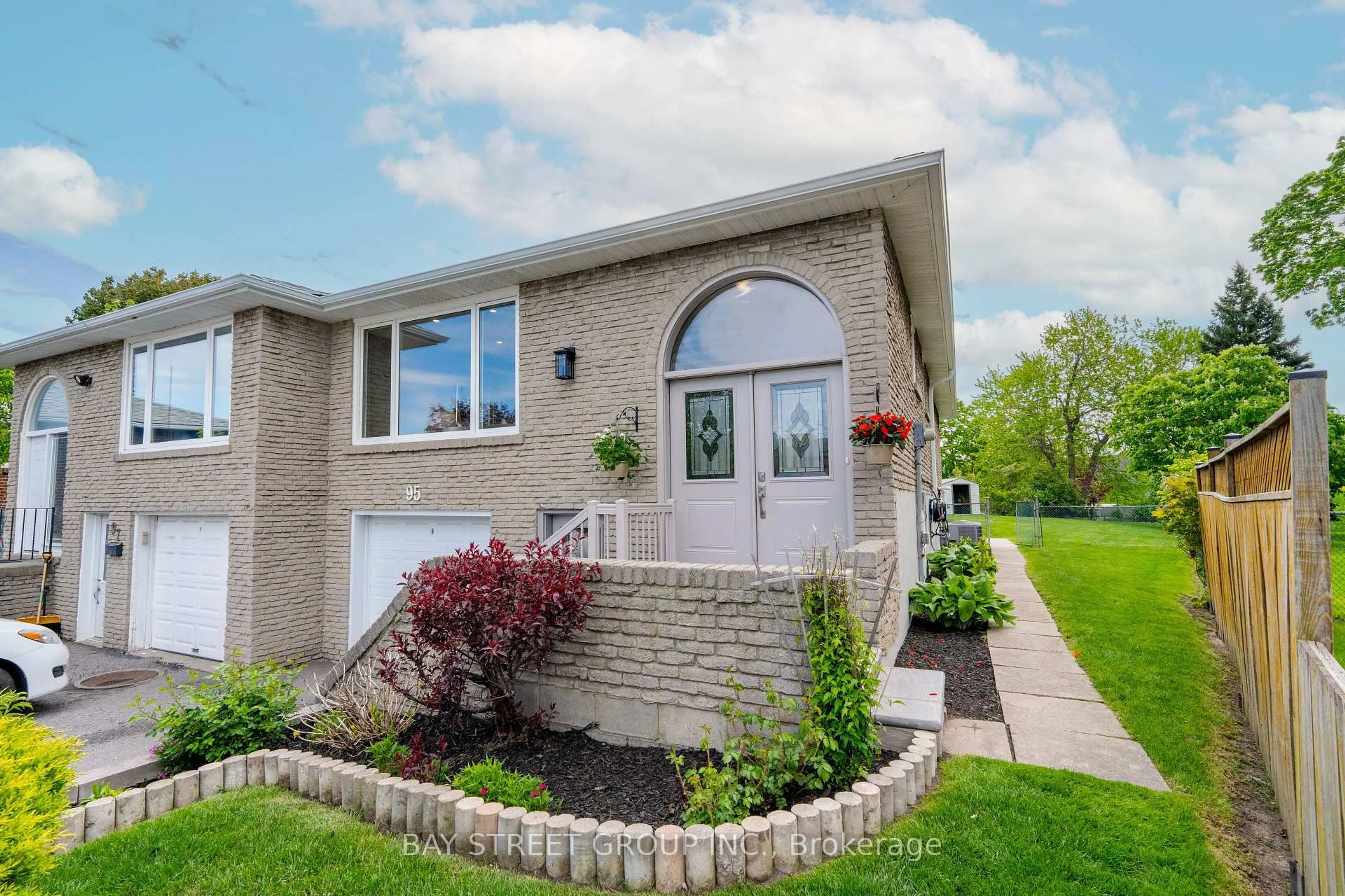Home with brick exterior material, street for 95 Heaslip Terr, Toronto Ontario M1T 1W8