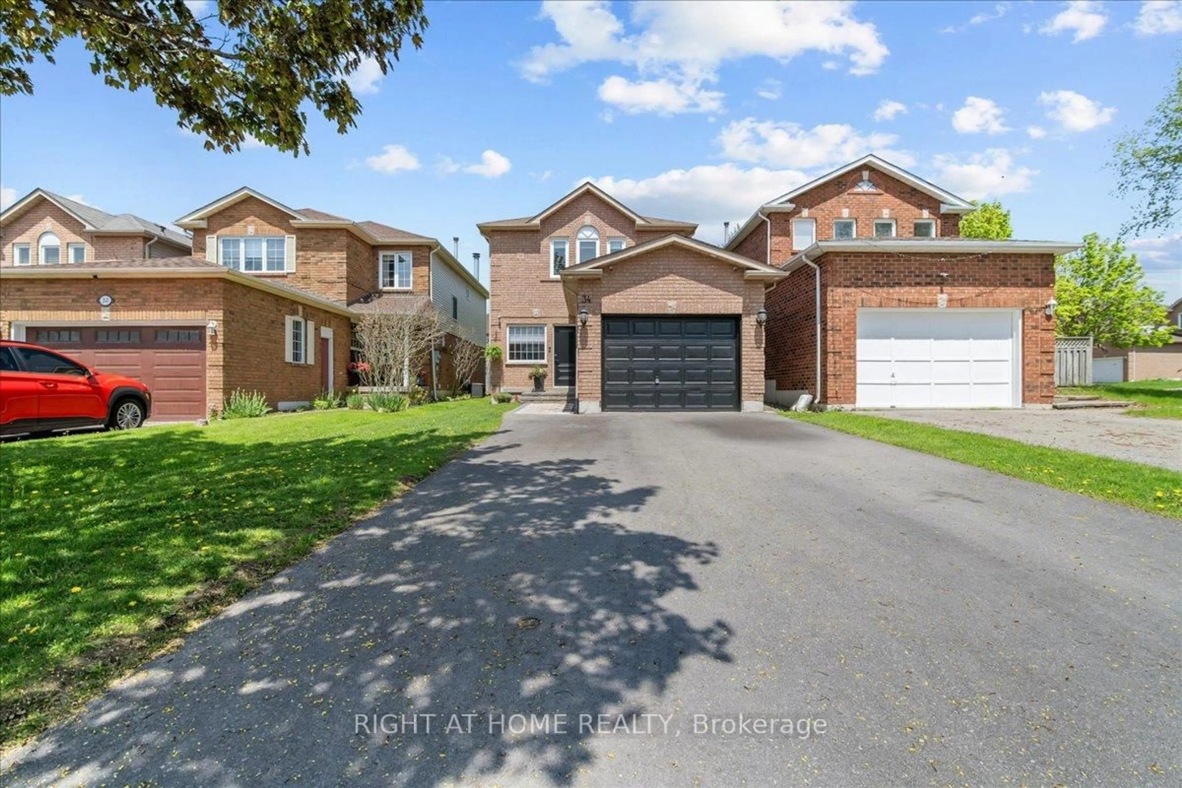 Home with brick exterior material, street for 34 Vail Meadows Cres, Clarington Ontario L1C 4T2