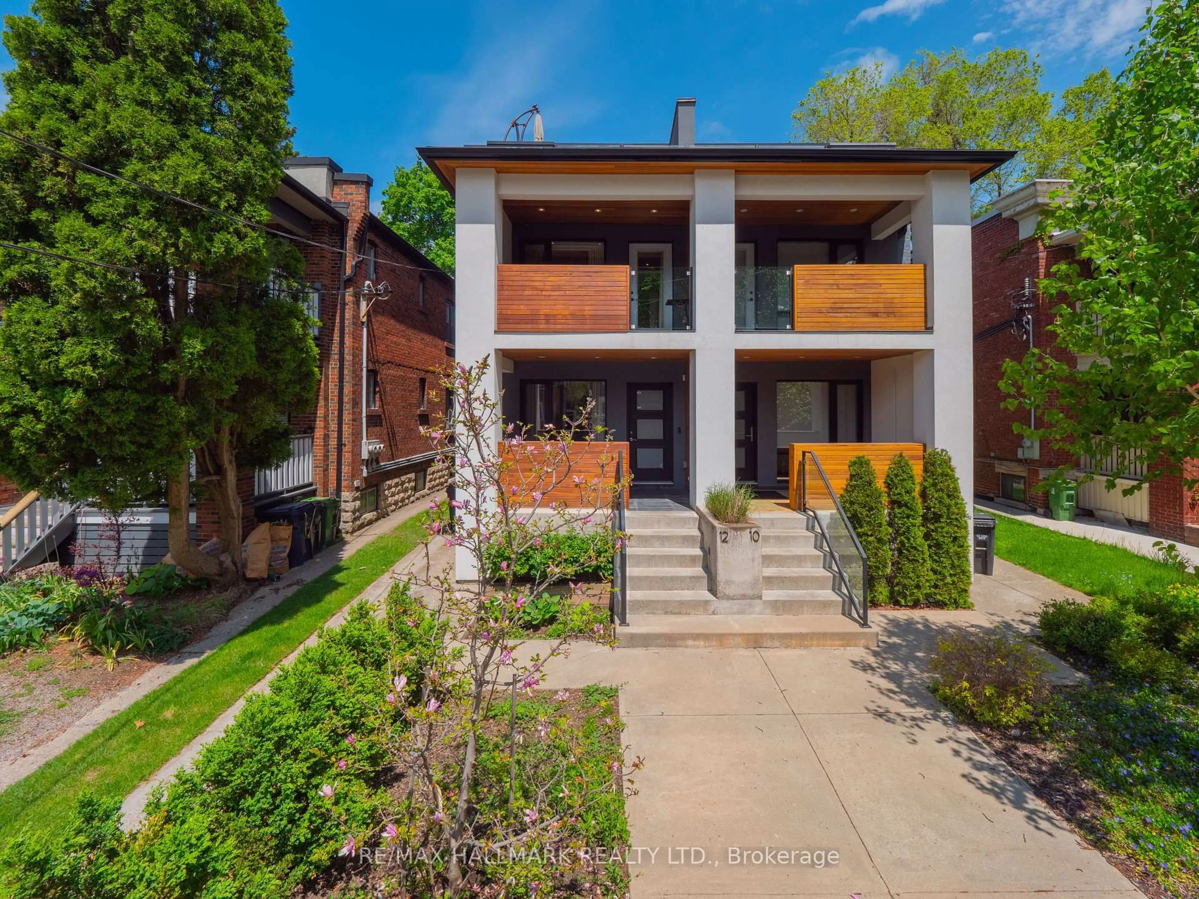Home with brick exterior material, street for 12 Thorncliffe Ave, Toronto Ontario M4K 1V5