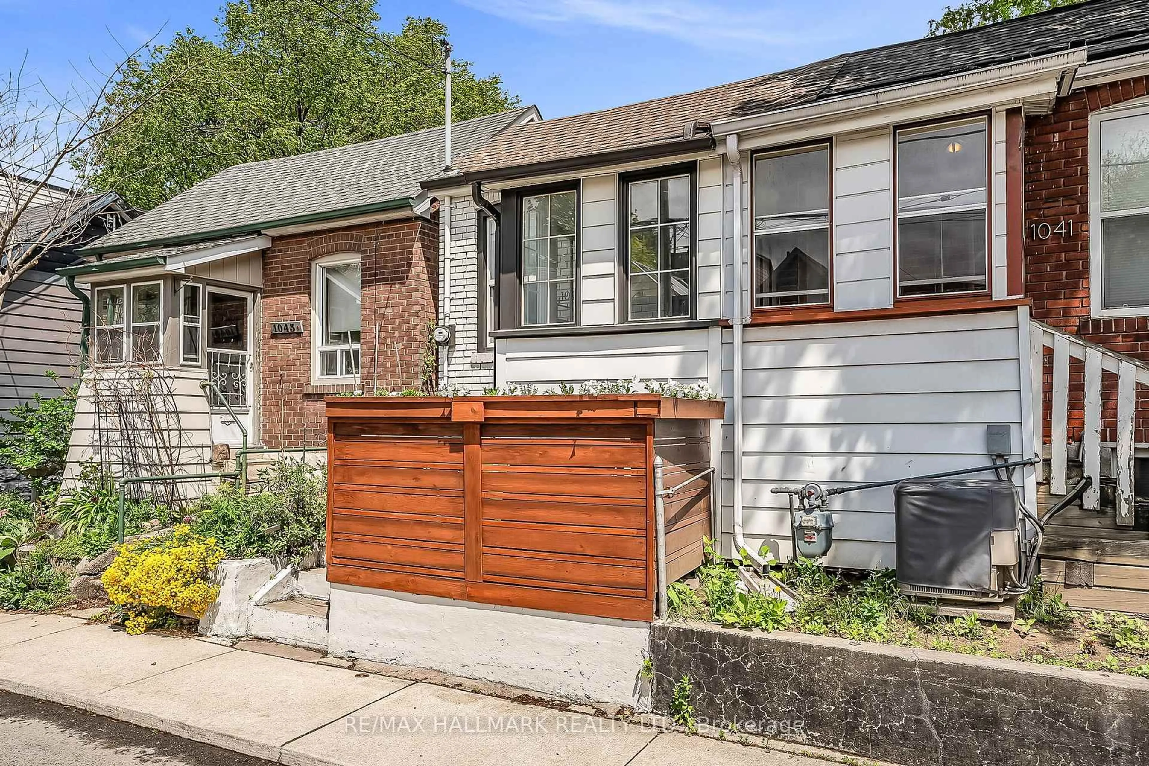 Home with brick exterior material, street for 1043 Craven Rd, Toronto Ontario M4J 4V7