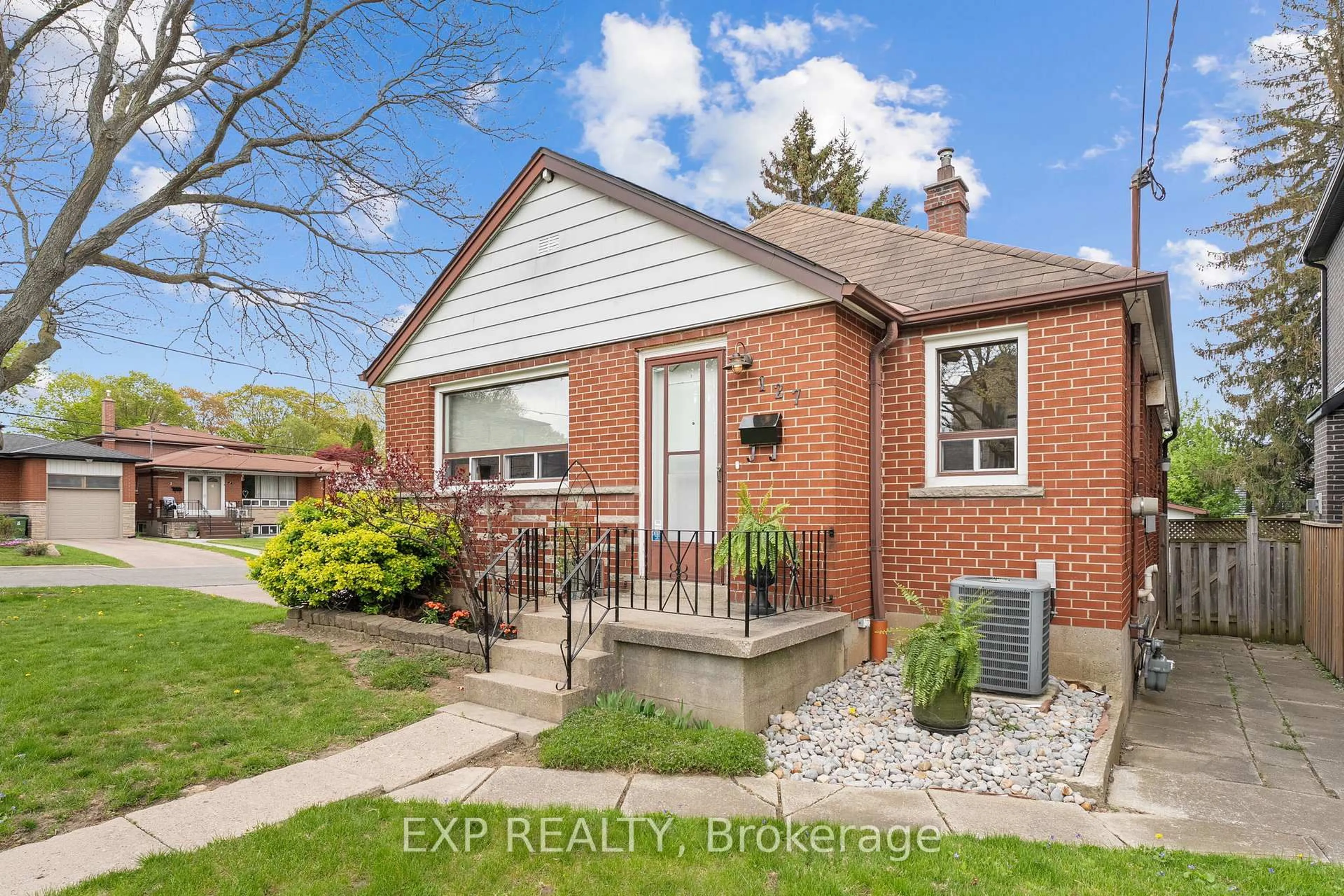 Home with brick exterior material, street for 127 Donside Dr, Toronto Ontario M1L 1P9