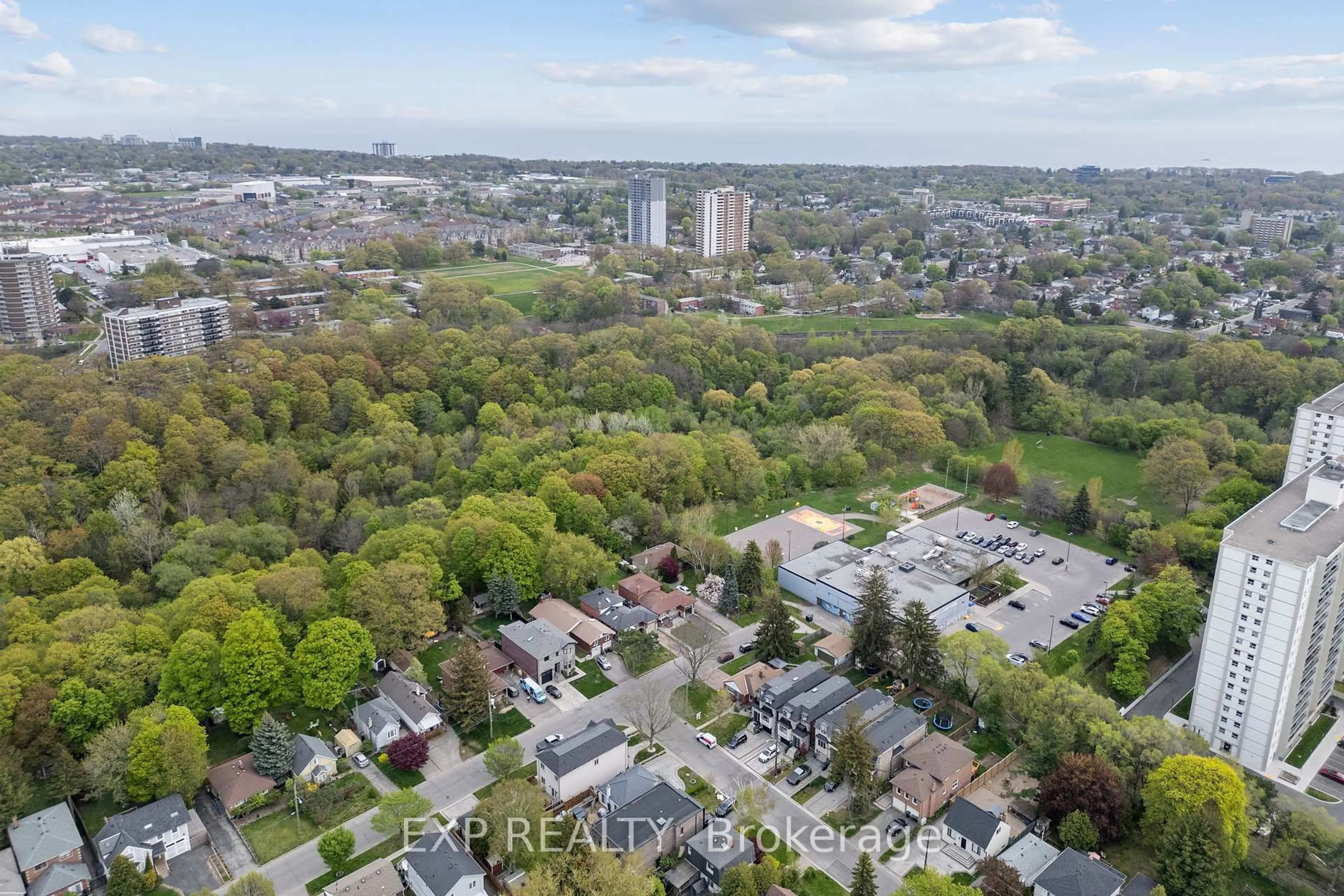 A pic from outside/outdoor area/front of a property/back of a property/a pic from drone, city buildings view from balcony for 127 Donside Dr, Toronto Ontario M1L 1P9