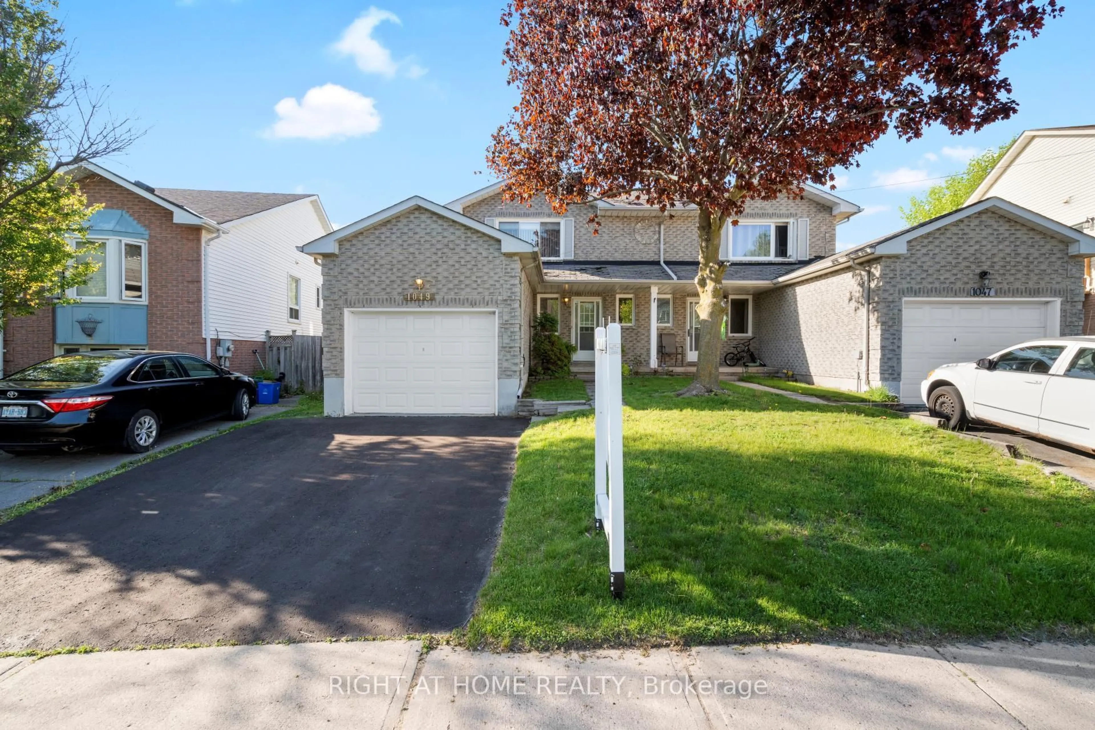 Home with vinyl exterior material, street for 1049 Attersley Dr, Oshawa Ontario L1K 1X8