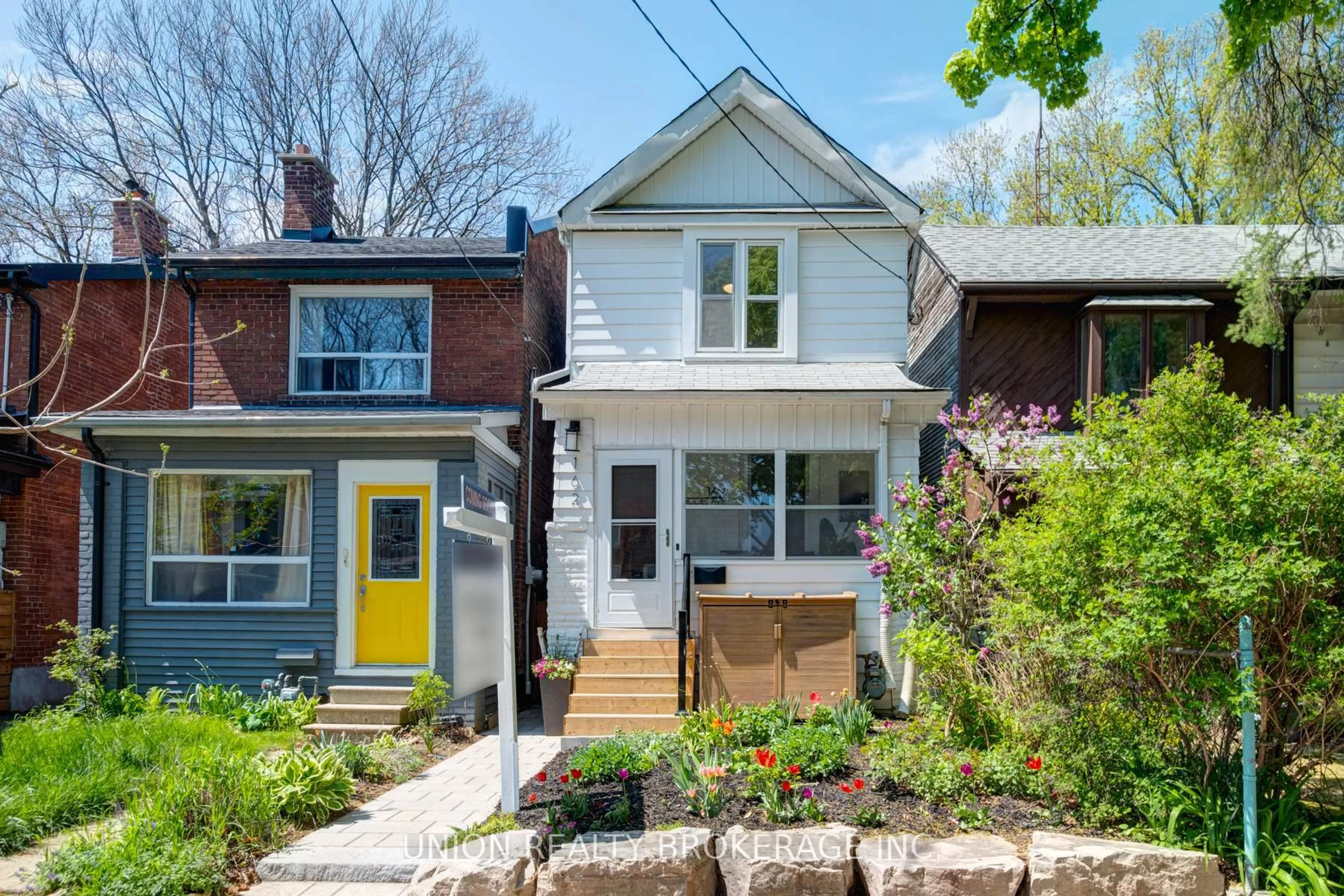 Home with brick exterior material, street for 162 Rhodes Ave, Toronto Ontario M4L 3A1