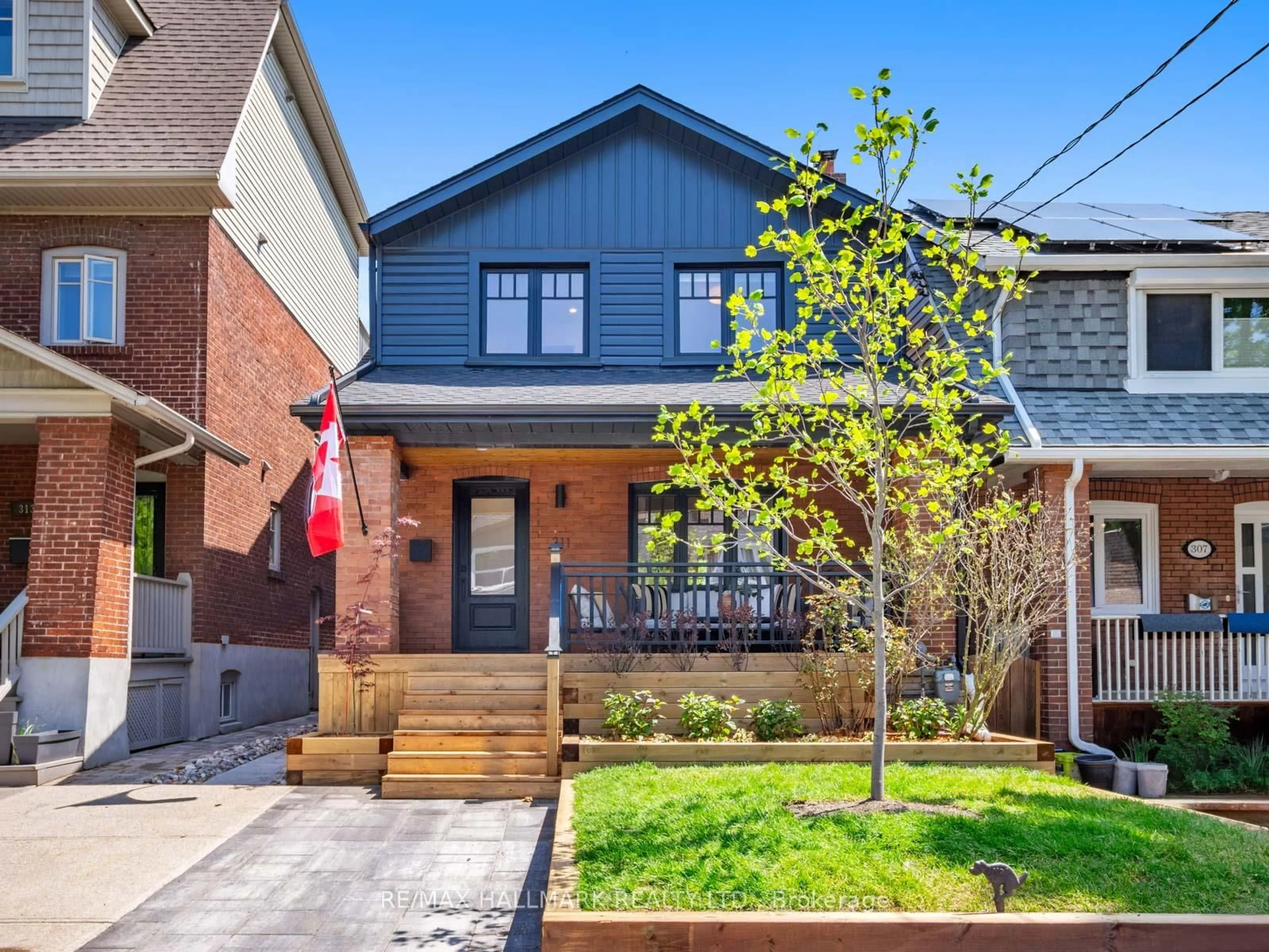 Home with brick exterior material, street for 311 Scarborough Rd, Toronto Ontario M4E 3M9