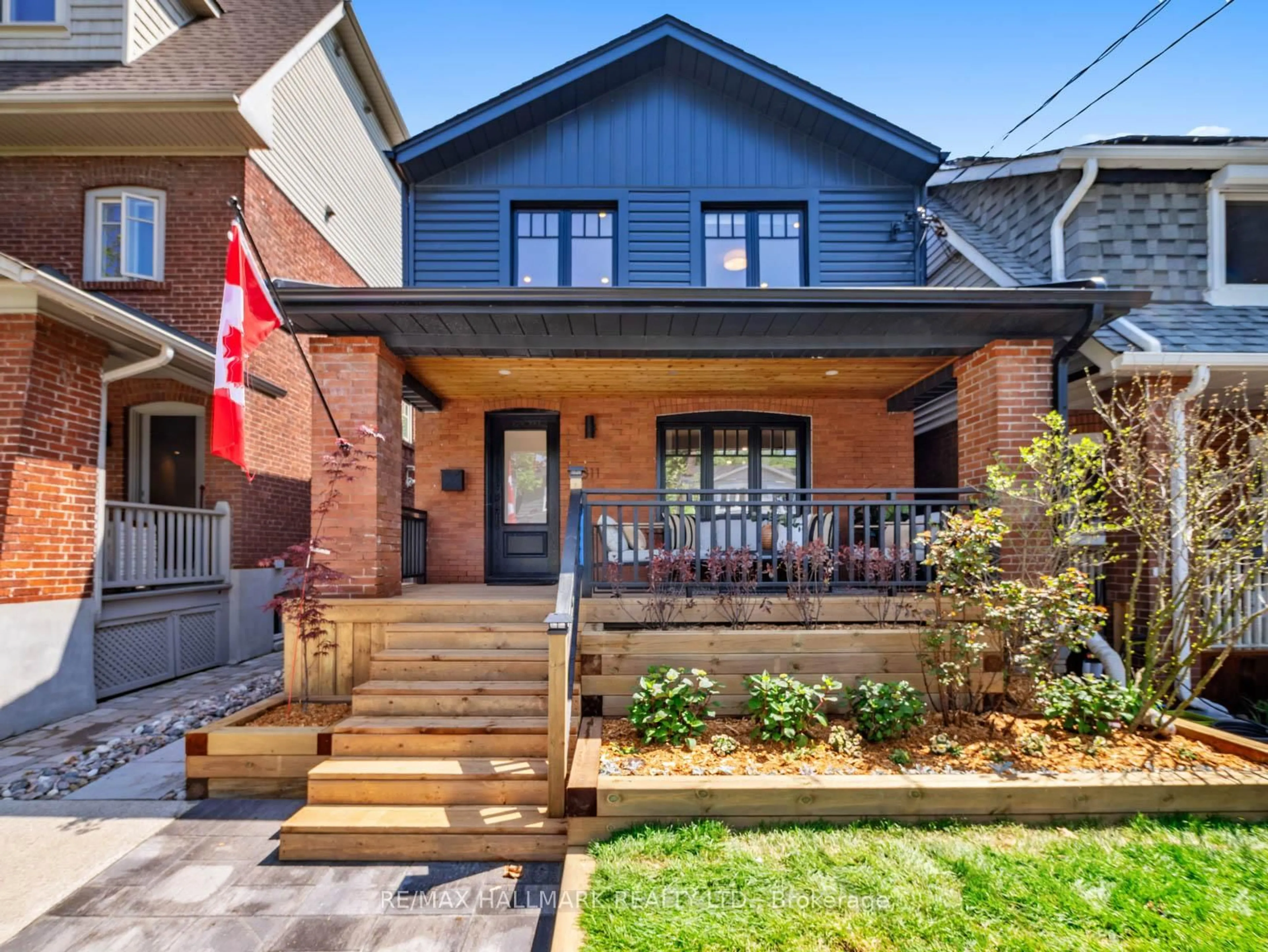 Home with brick exterior material, street for 311 Scarborough Rd, Toronto Ontario M4E 3M9