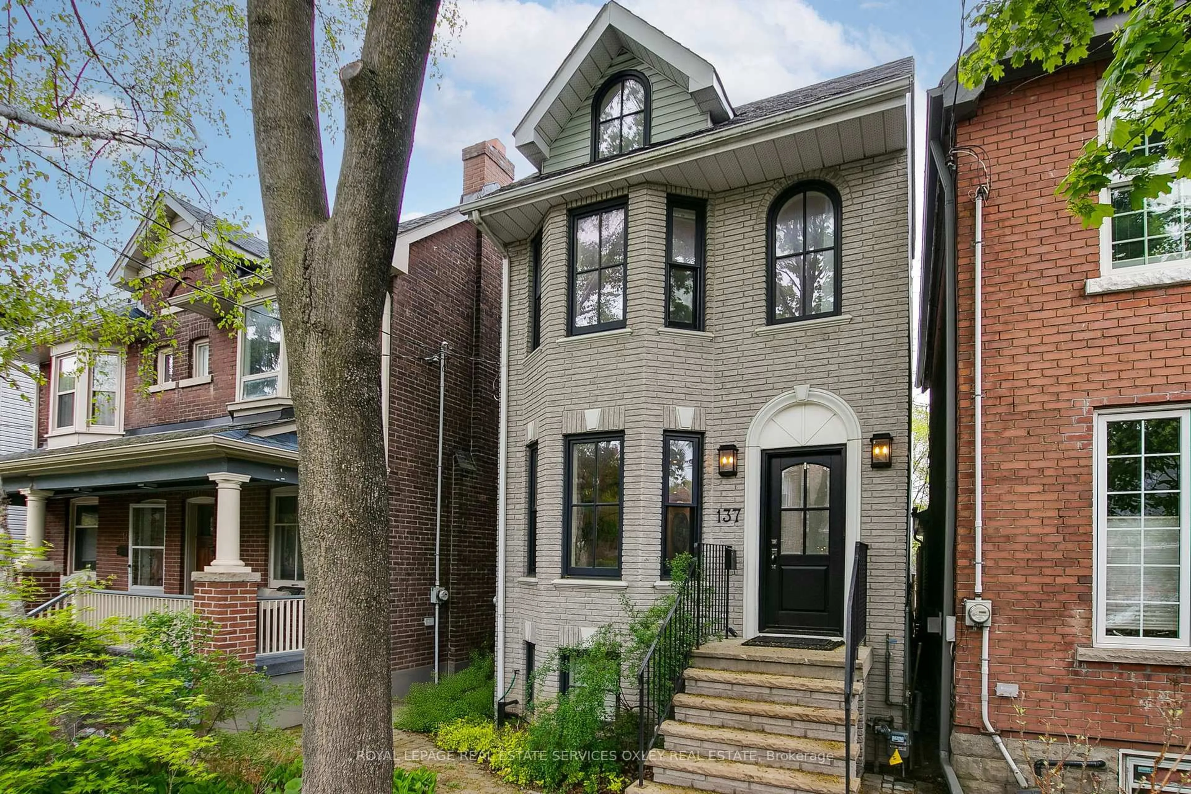 Home with brick exterior material, street for 137 Hogarth Ave, Toronto Ontario M4K 1K5