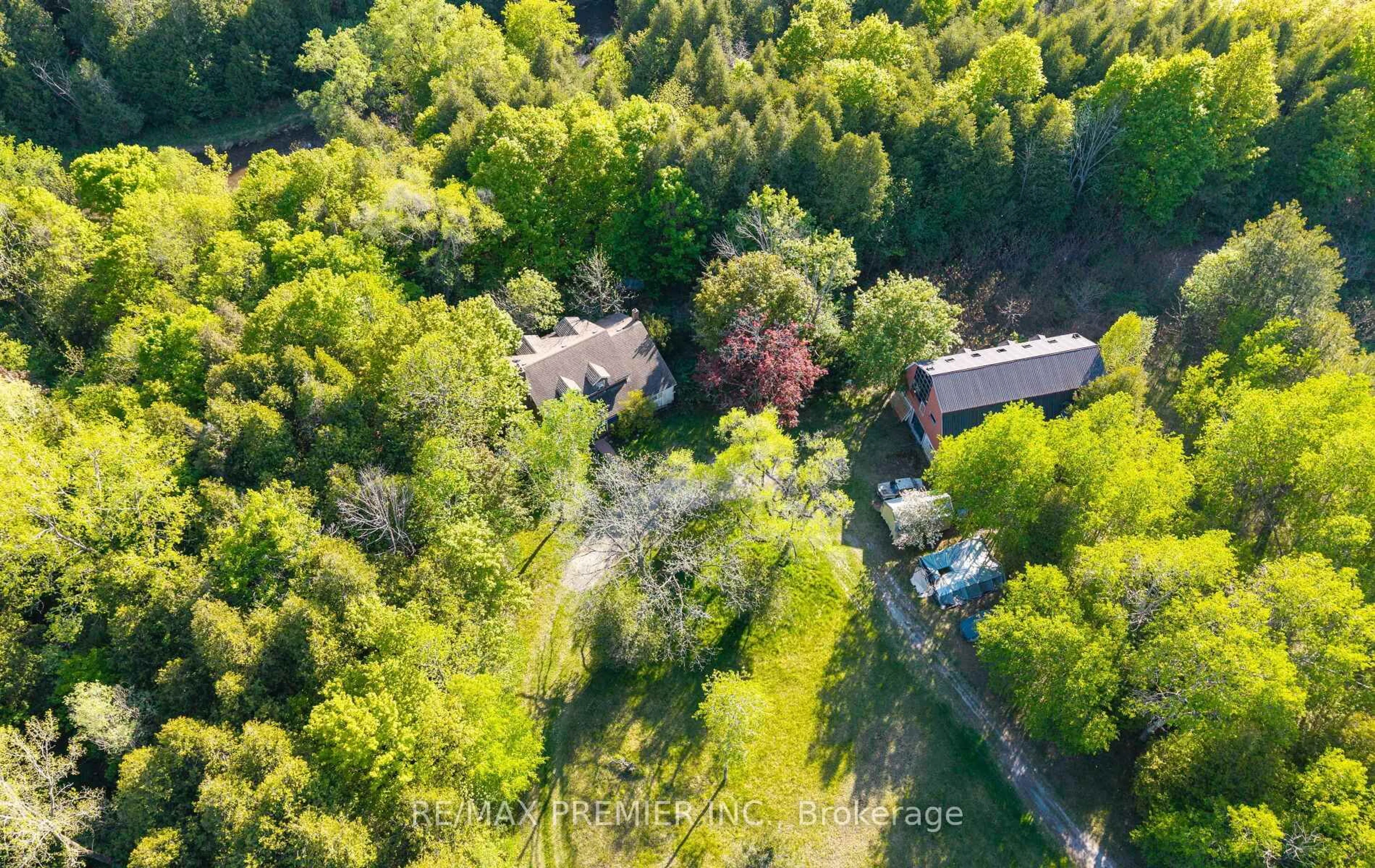 A pic from outside/outdoor area/front of a property/back of a property/a pic from drone, forest/trees view for 3722 Old Scugog Rd, Clarington Ontario L1C 4J2