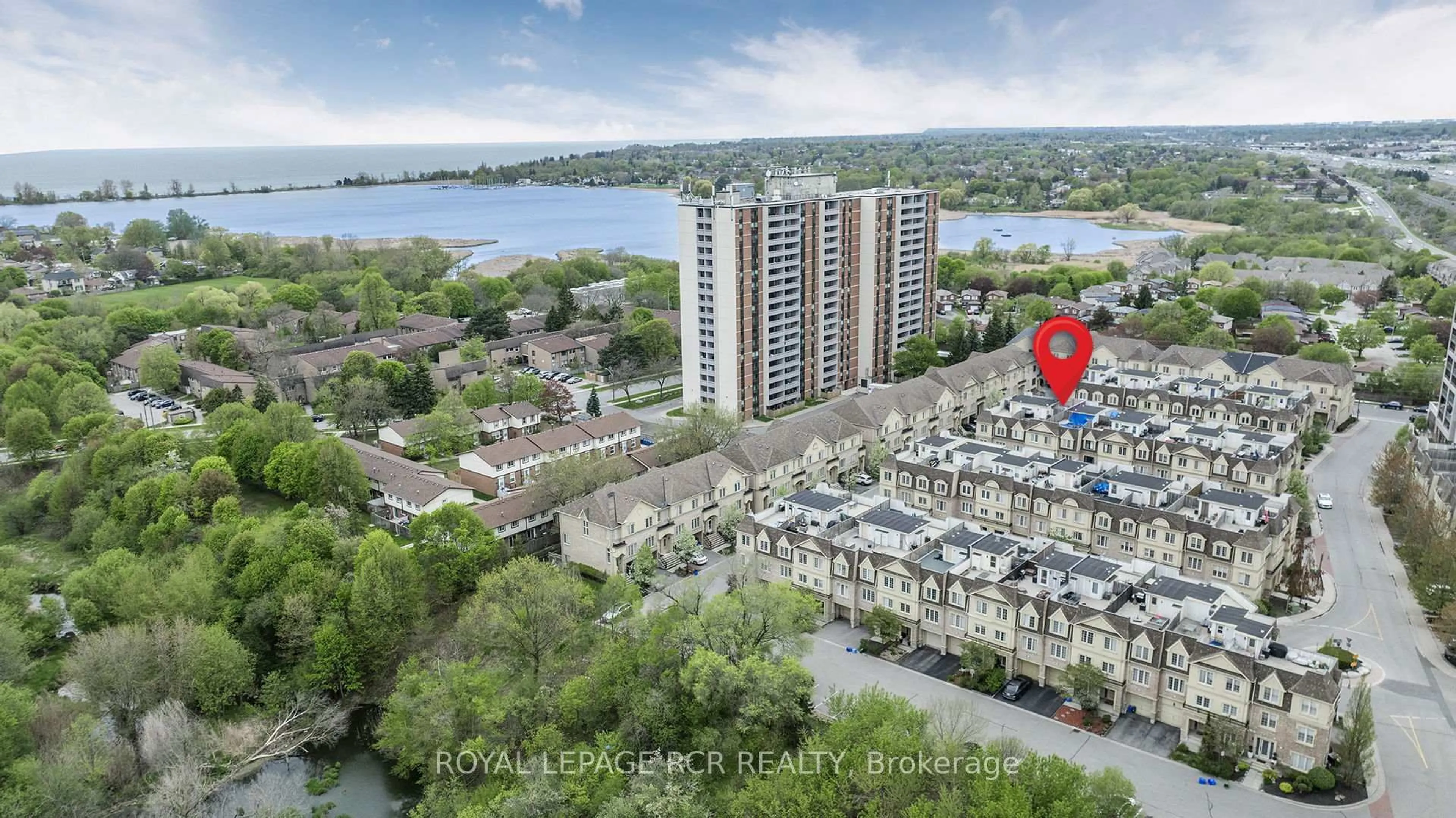 A pic from outside/outdoor area/front of a property/back of a property/a pic from drone, city buildings view from balcony for 1250 St. Martins Dr #95, Pickering Ontario L1W 0A2
