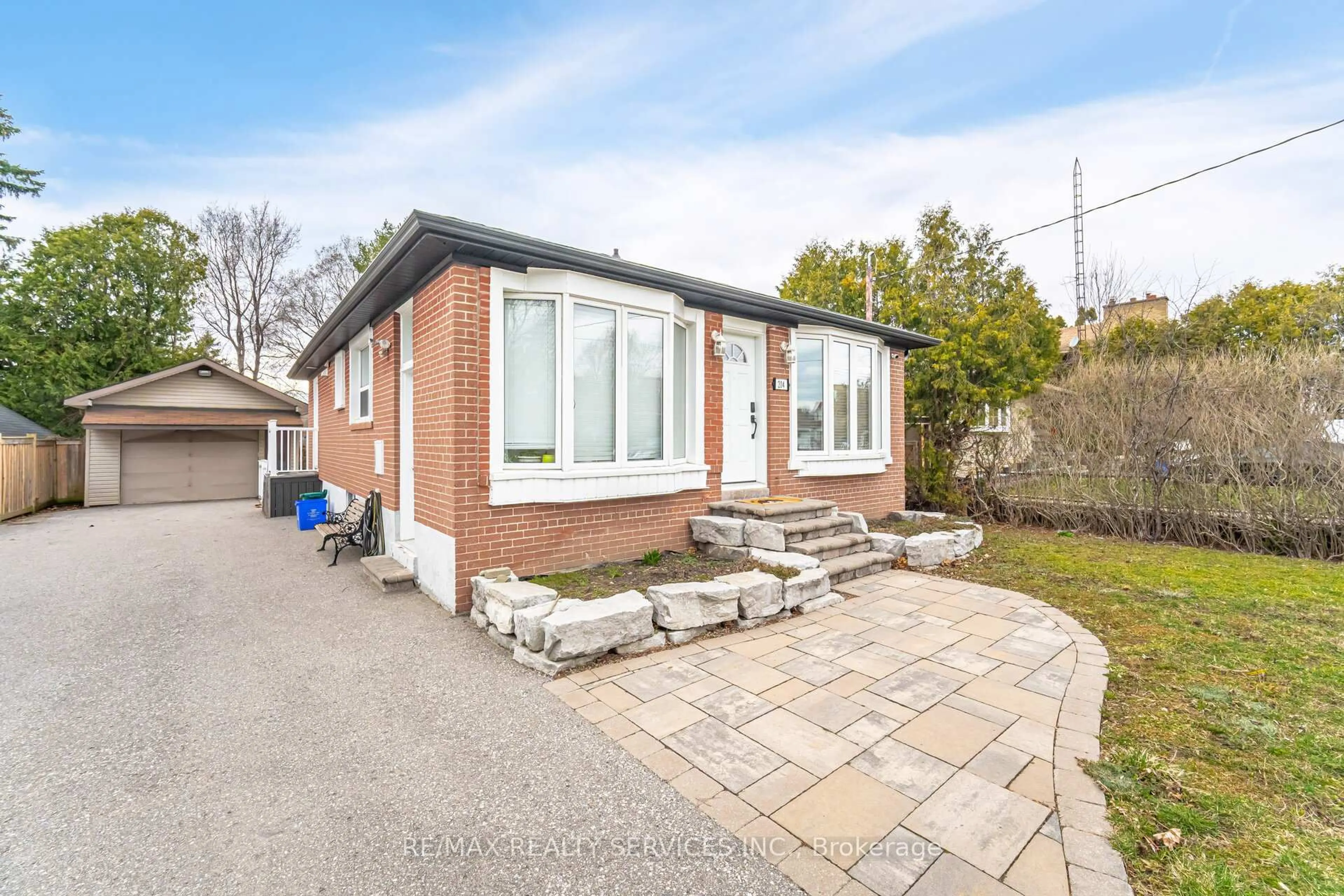 Home with brick exterior material, street for 204 Craydon Rd, Whitby Ontario L1N 2B6