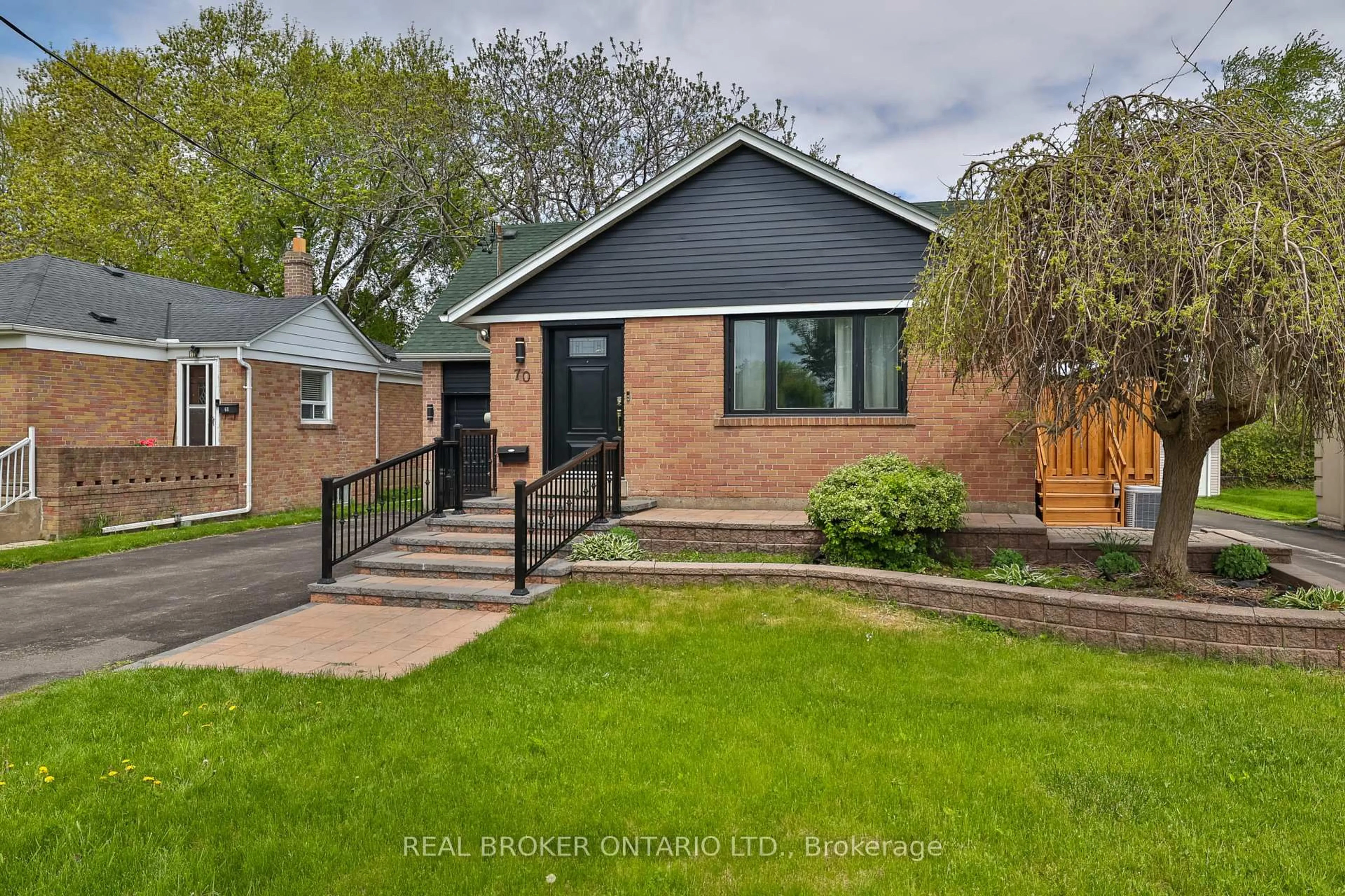 Home with brick exterior material, street for 70 Colonial Ave, Toronto Ontario M1M 2C5