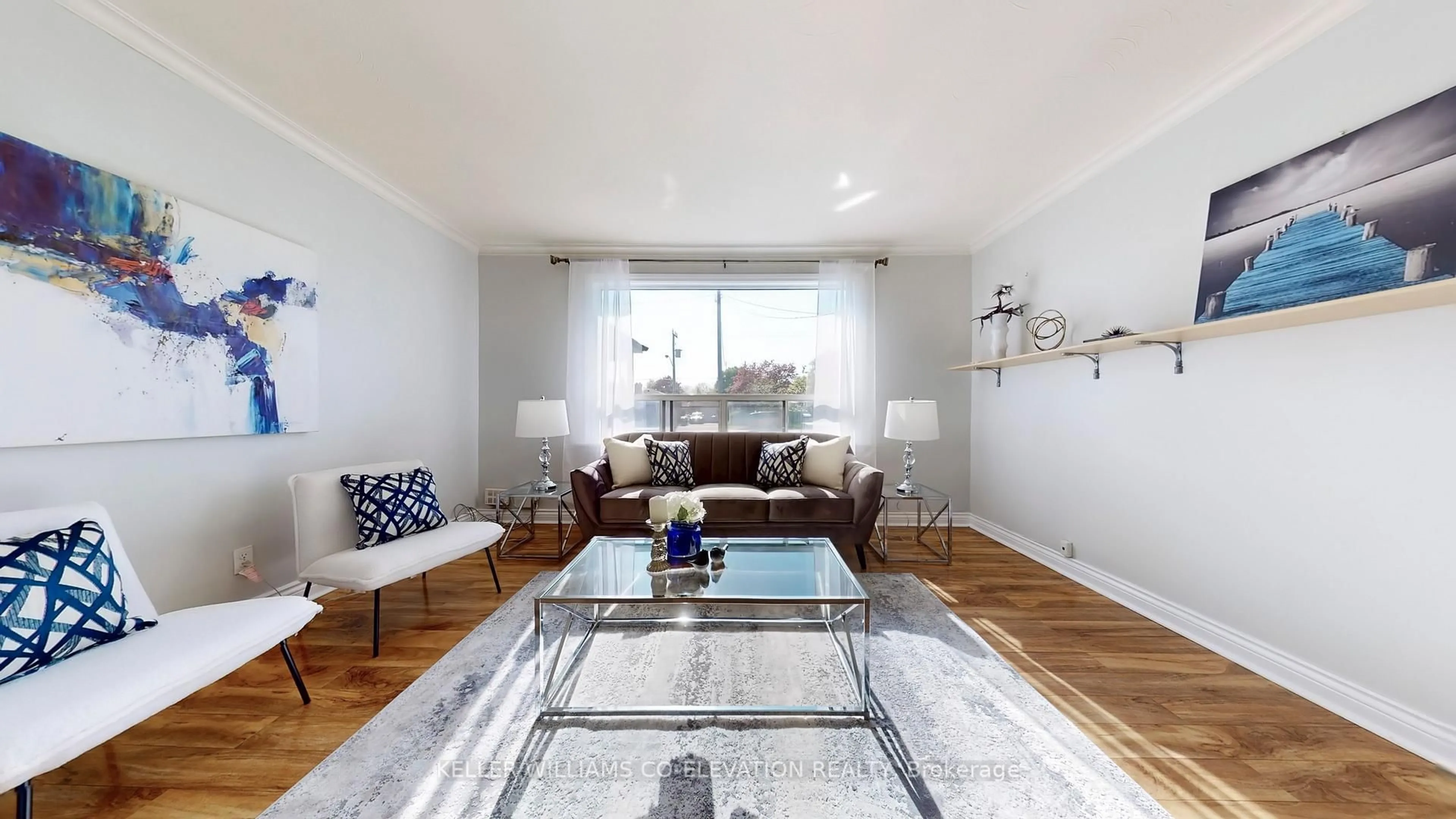 Living room with furniture, wood/laminate floor for 1465 Danforth Rd, Toronto Ontario M1J 1H4