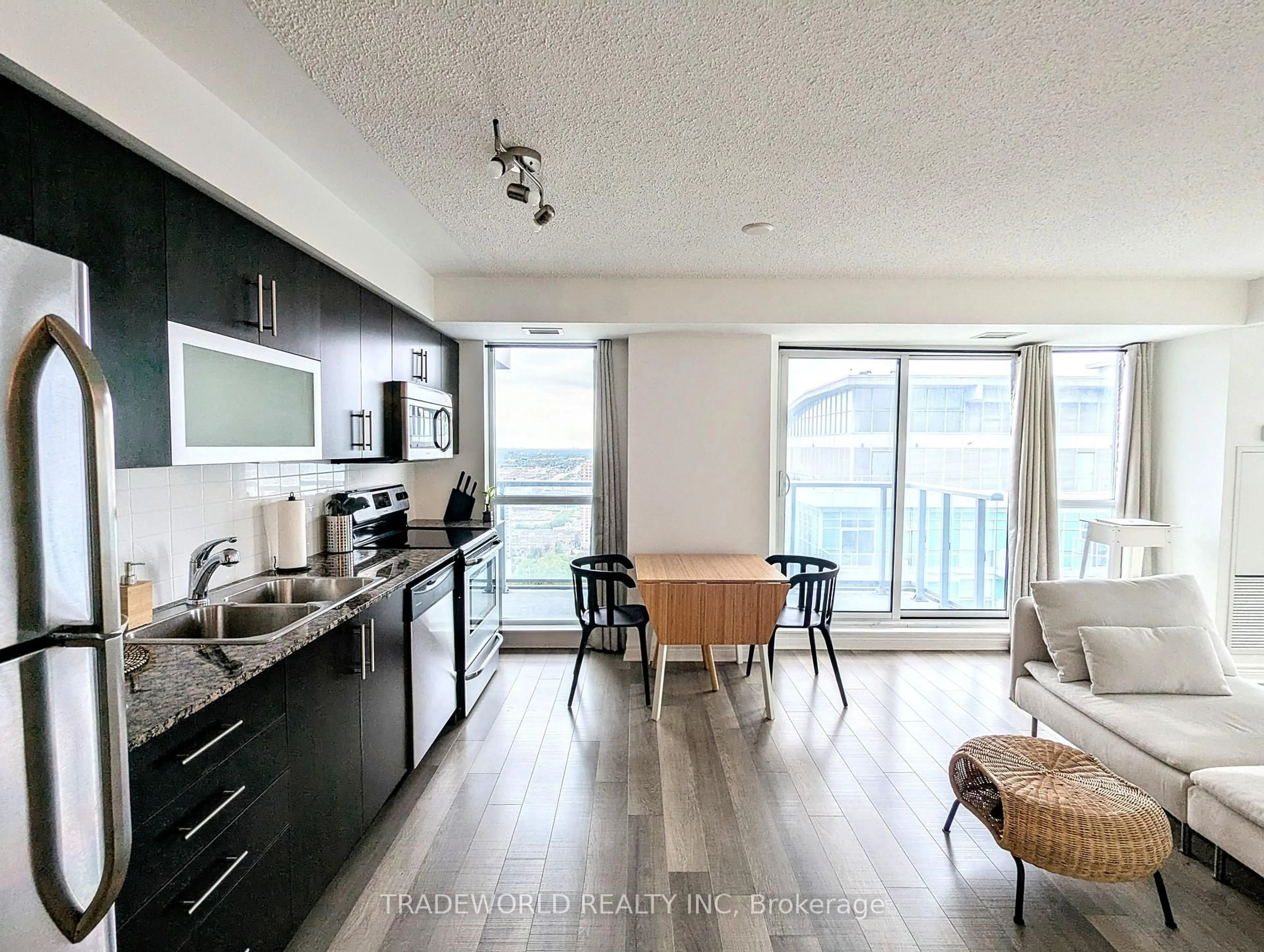 Open concept kitchen, wood/laminate floor for 50 Town Centre Crt #3304, Toronto Ontario M1P 0A9