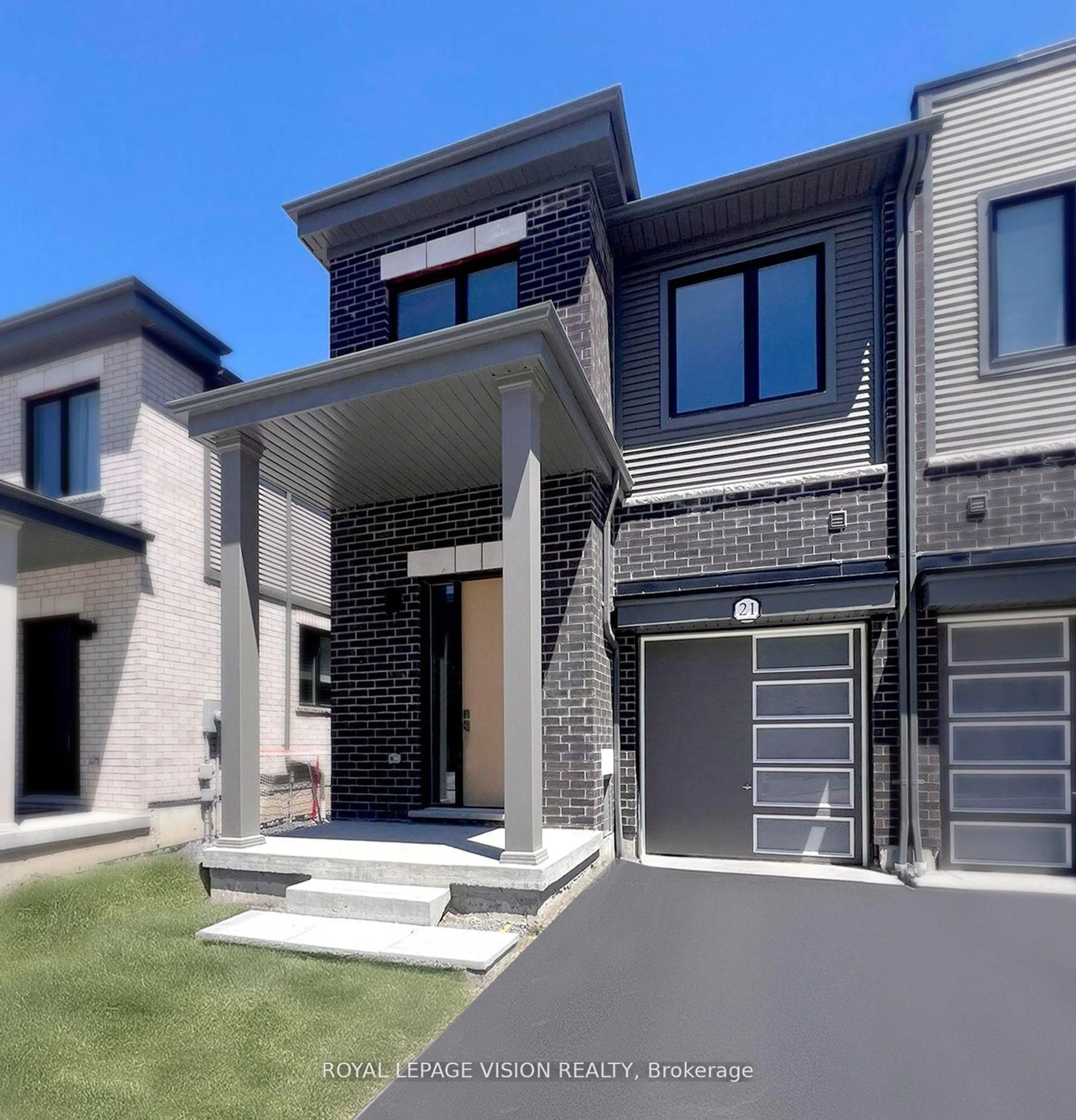 Home with brick exterior material, street for 21 Sorbara Way, Whitby Ontario L1M 0M4