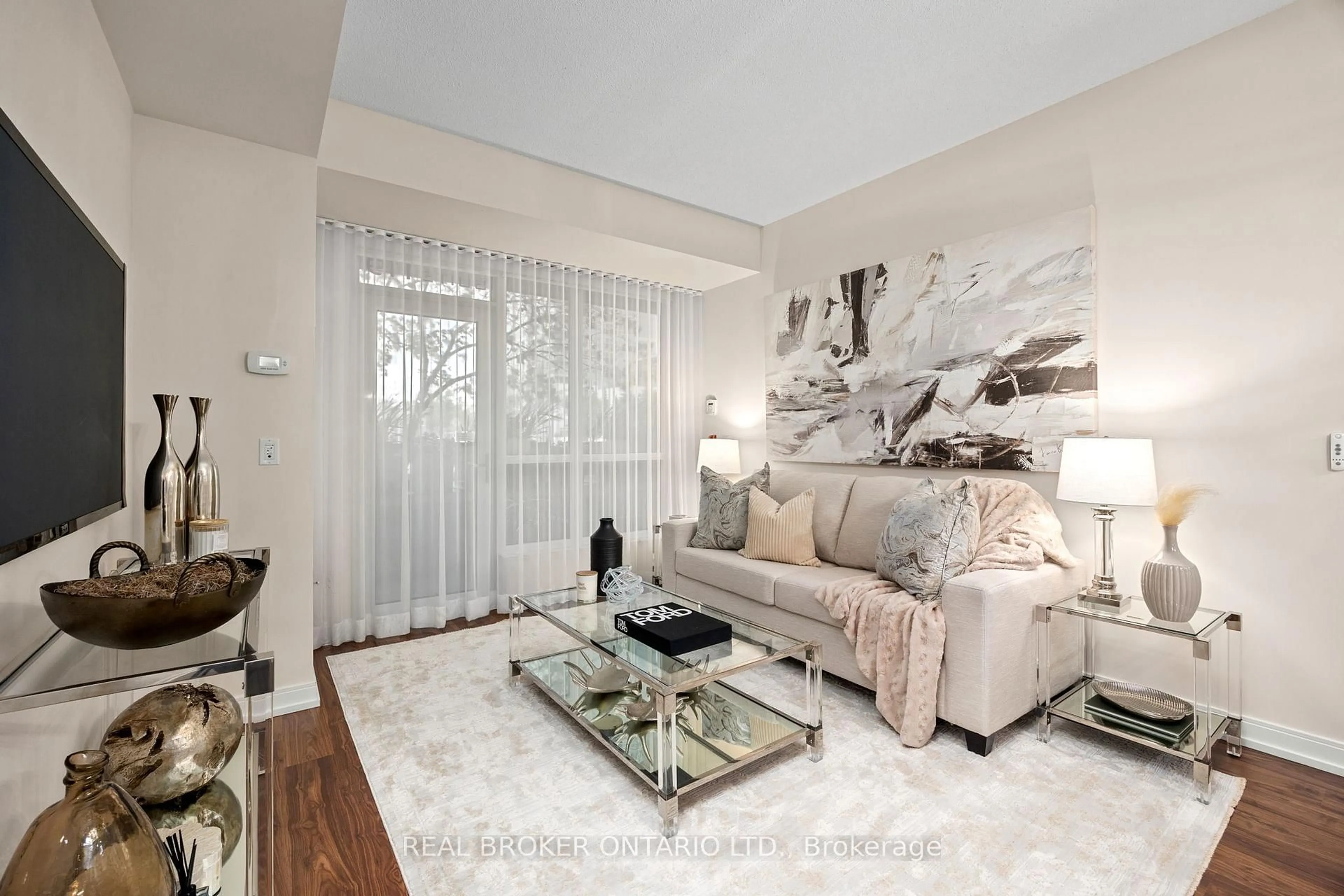 Living room with furniture, unknown for 181 Village Green Sq #119, Toronto Ontario M1S 0K6