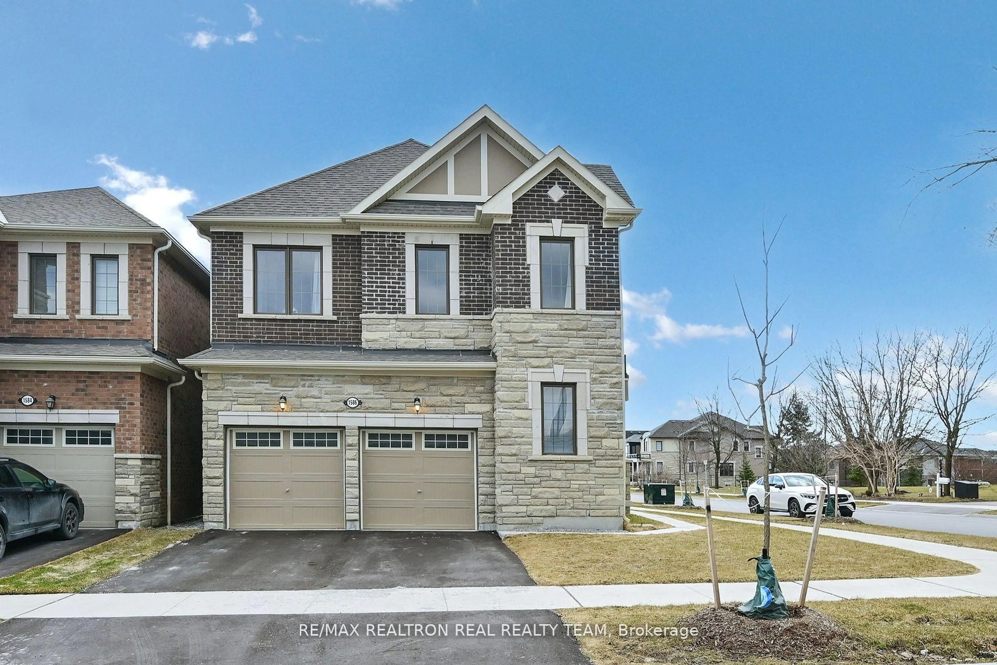 Home with brick exterior material, street for 1586 Scarlett Tr, Pickering Ontario L1X 0N9