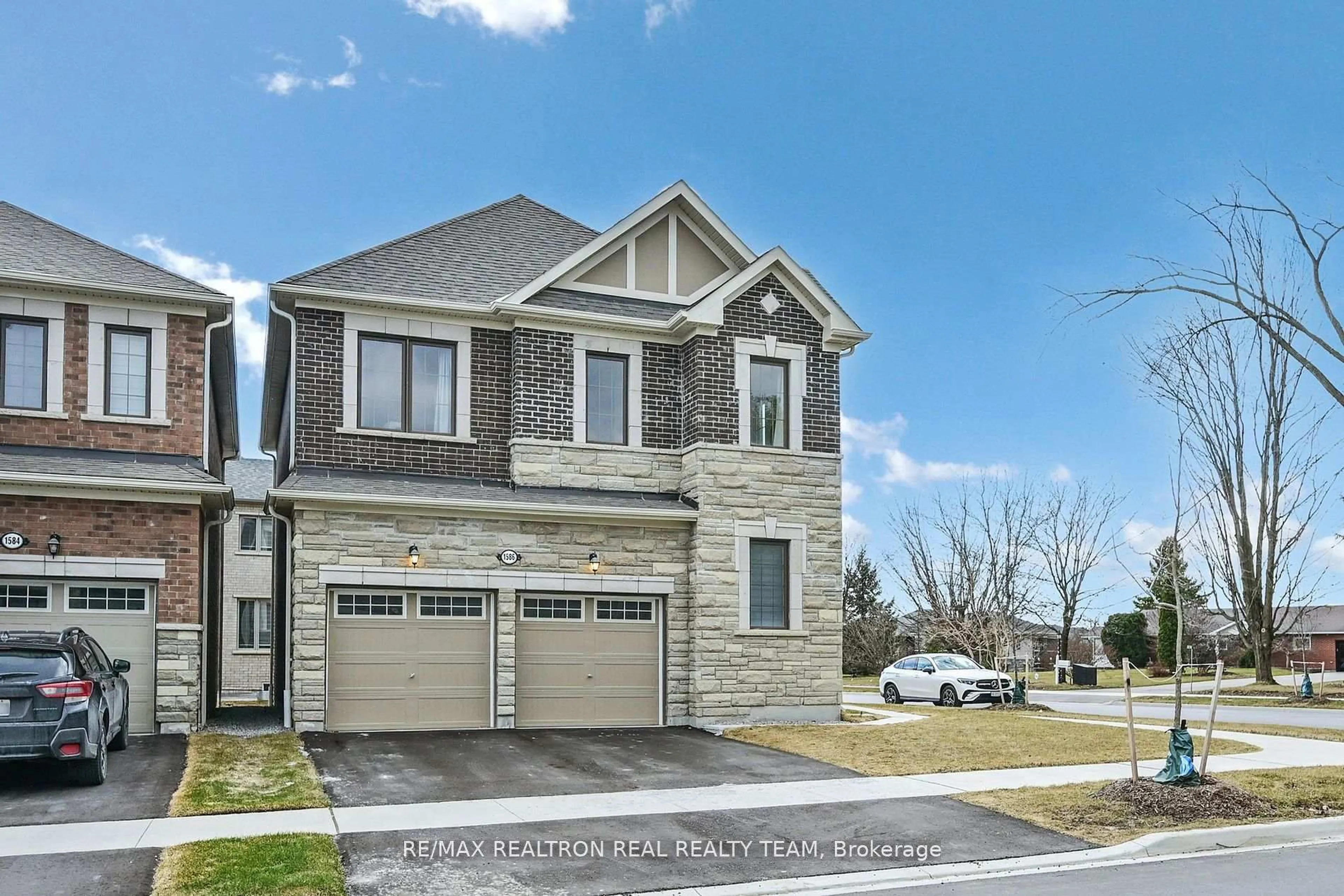 Home with brick exterior material, street for 1586 Scarlett Tr, Pickering Ontario L1X 0N9