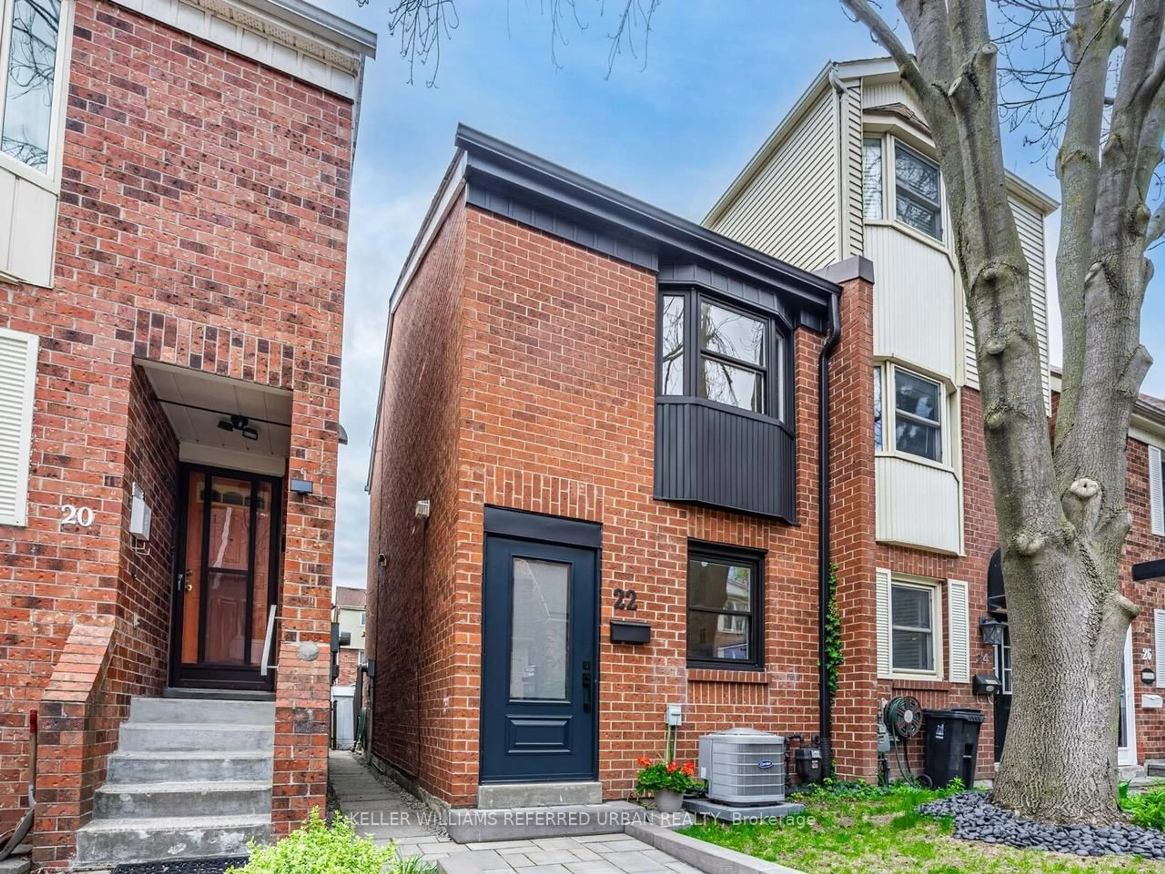 Home with brick exterior material, street for 22 Valifor Pl, Toronto Ontario M4J 4Z7