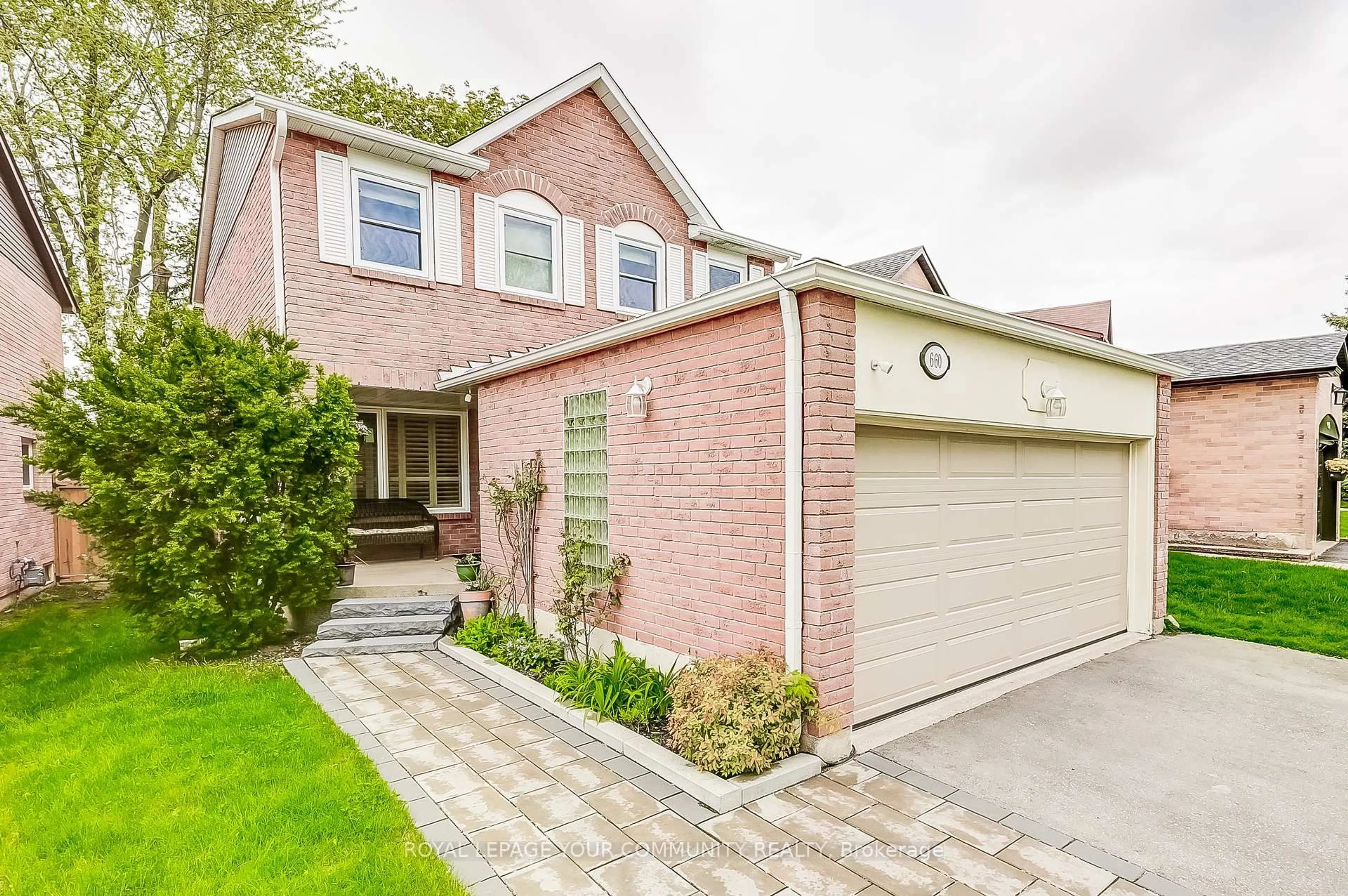 Home with brick exterior material, street for 660 Foxwood Tr, Pickering Ontario L1V 3X8
