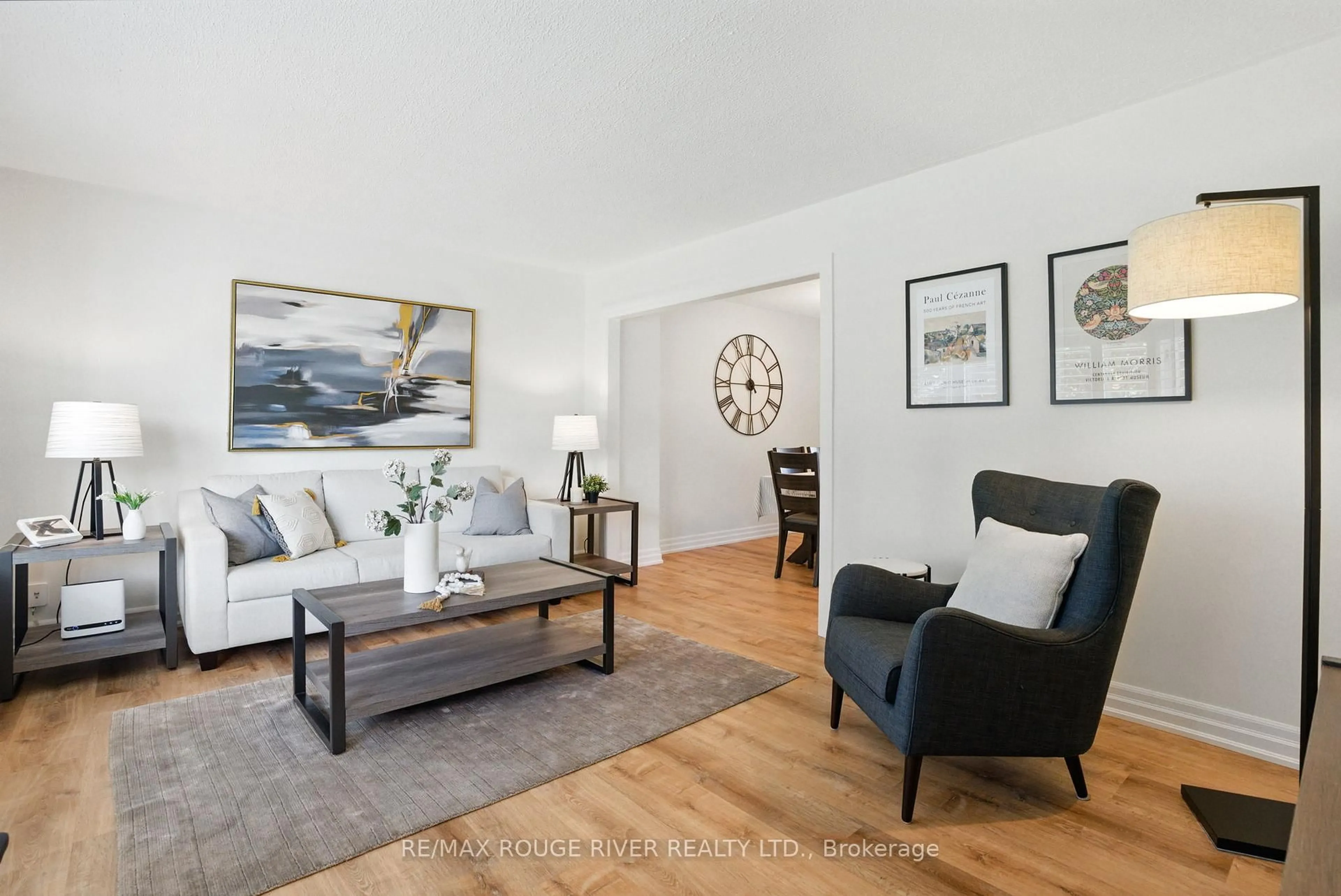 Living room with furniture, wood/laminate floor for 121 Exeter Rd, Ajax Ontario L1S 2K4