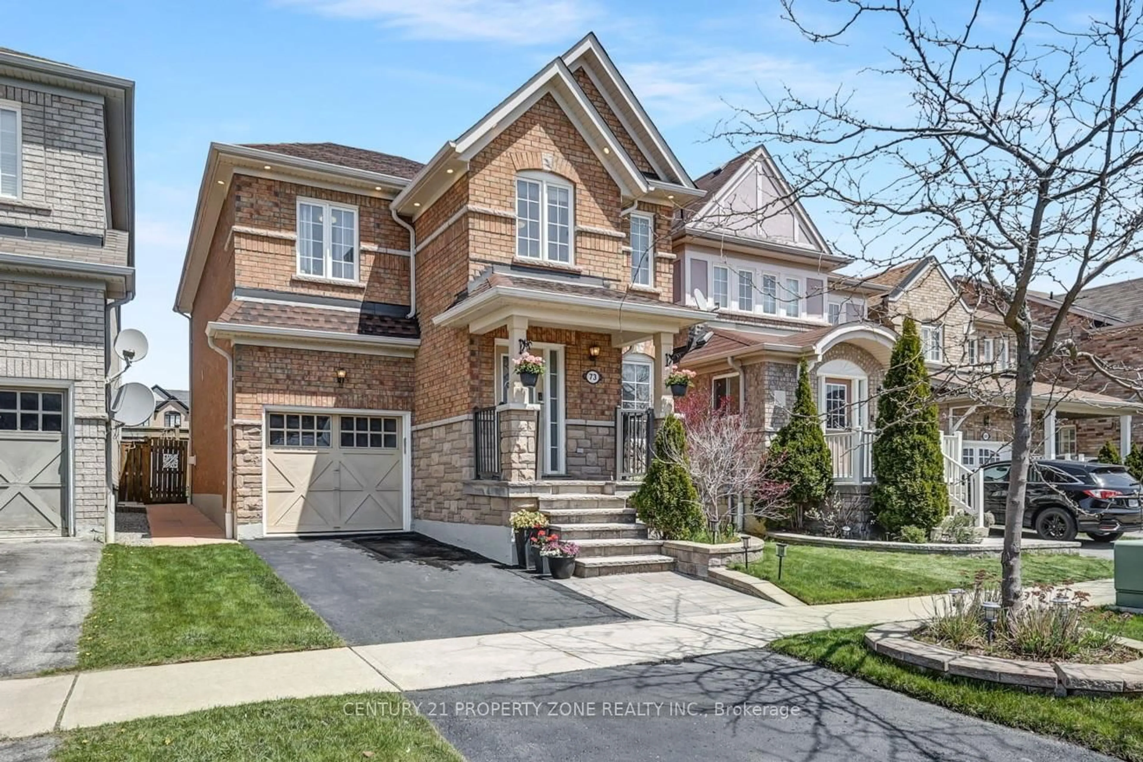 Home with brick exterior material, street for 73 Feint Dr, Ajax Ontario L1T 0E7