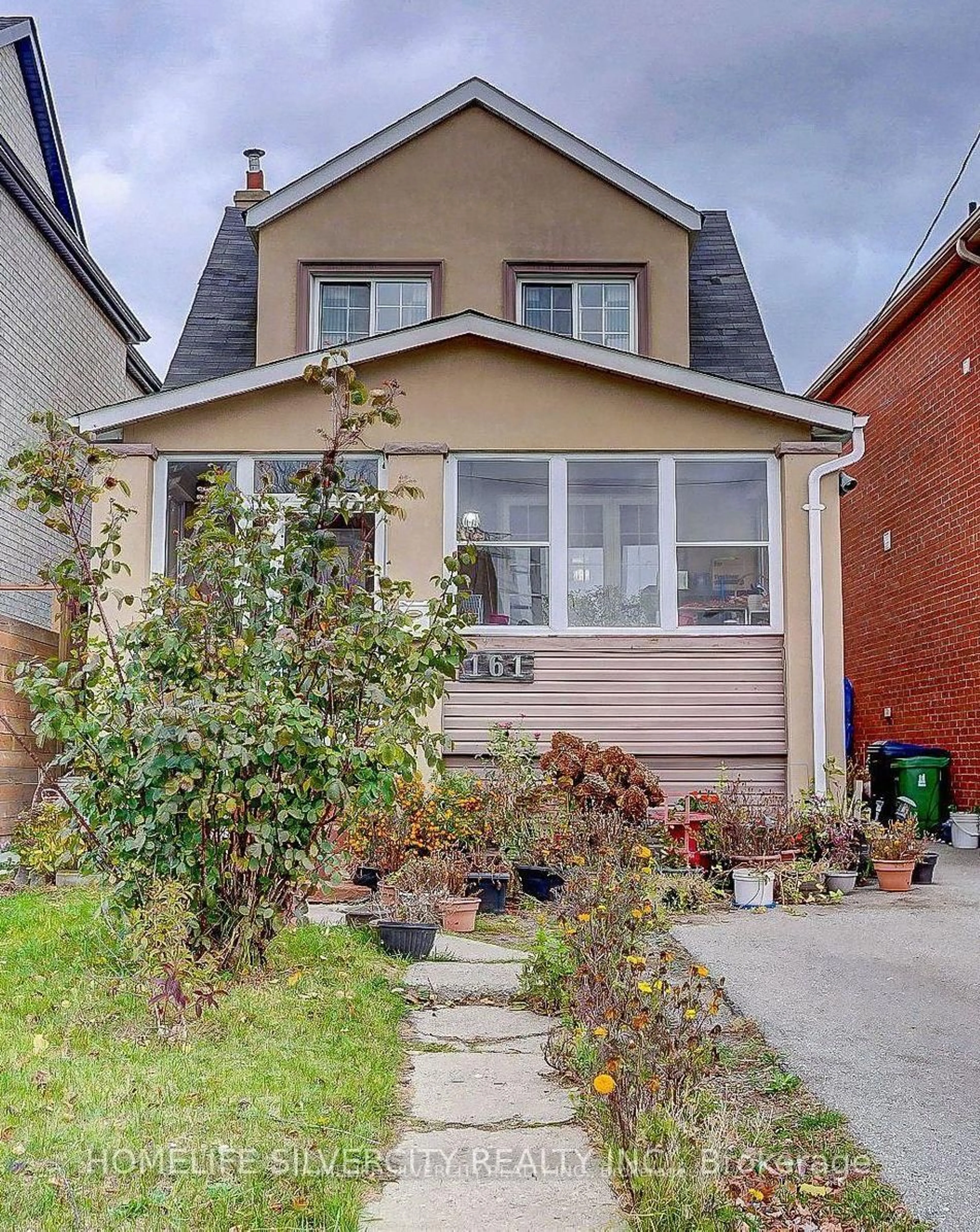 Home with brick exterior material, street for 161 August Ave, Toronto Ontario M1L 3N3