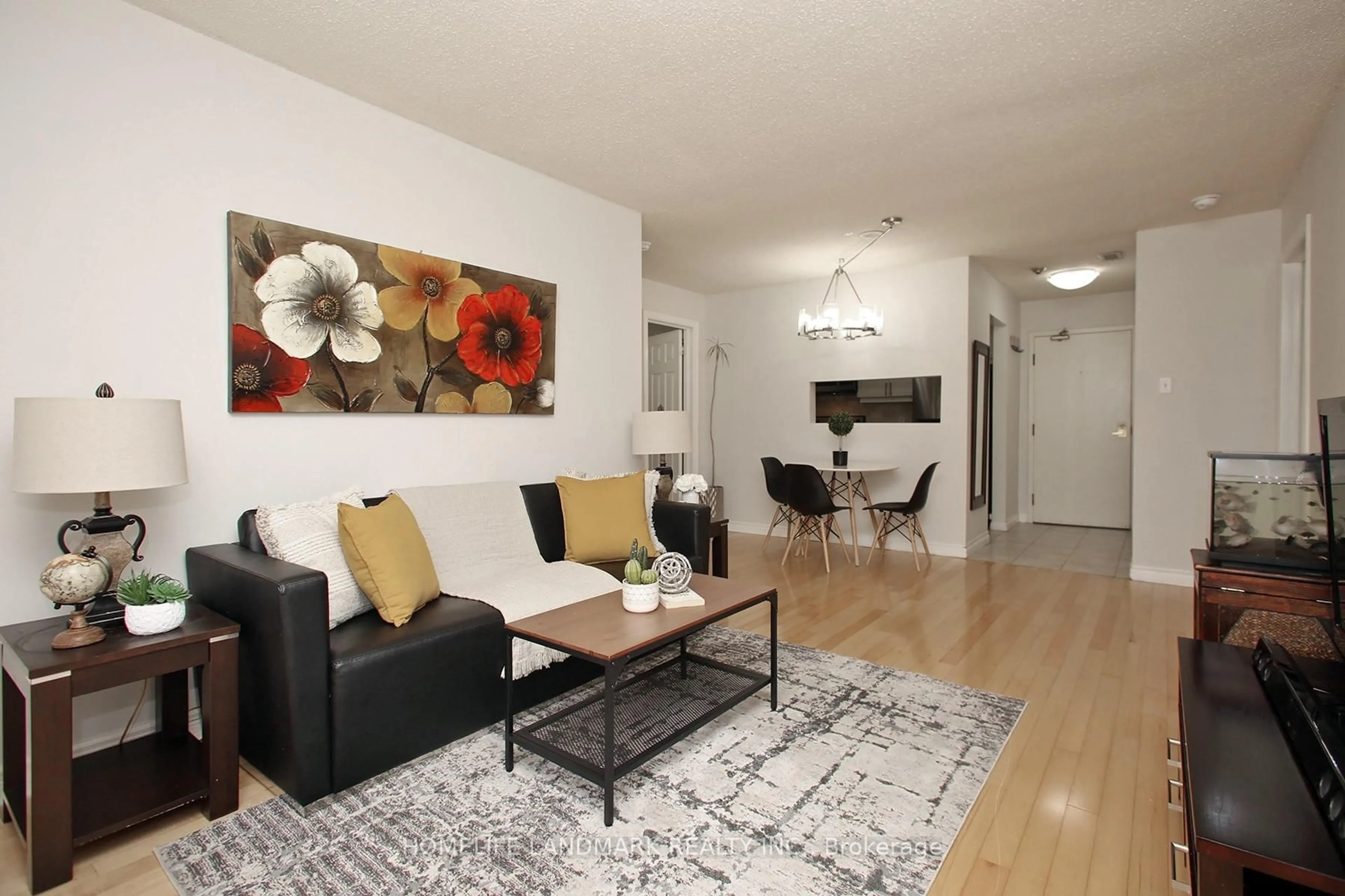 Living room with furniture, wood/laminate floor for 193 Lake Driveway Dr #118, Ajax Ontario L1S 7H8