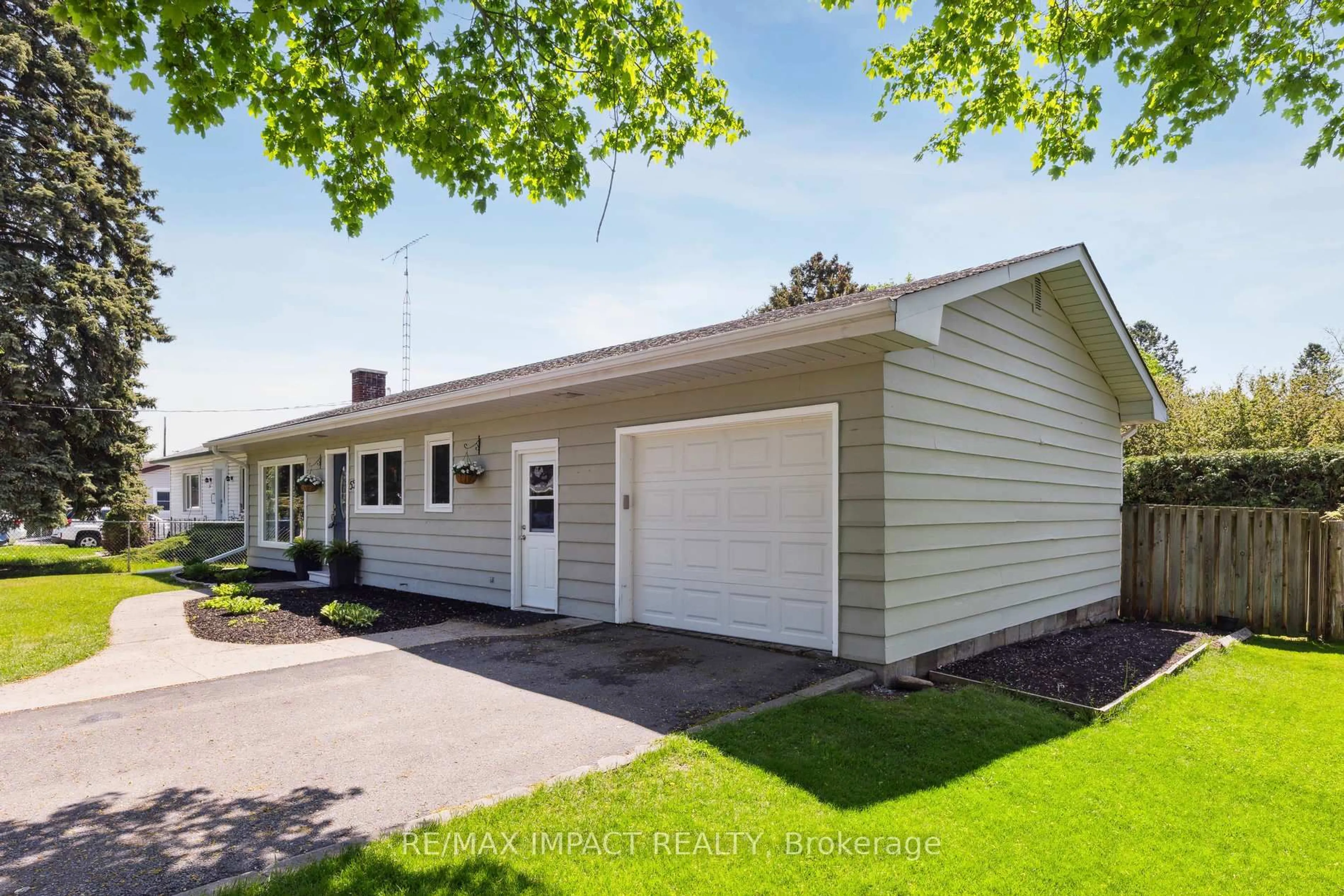 Home with vinyl exterior material, street for 55 Cobbledick St St, Clarington Ontario L0B 1M0