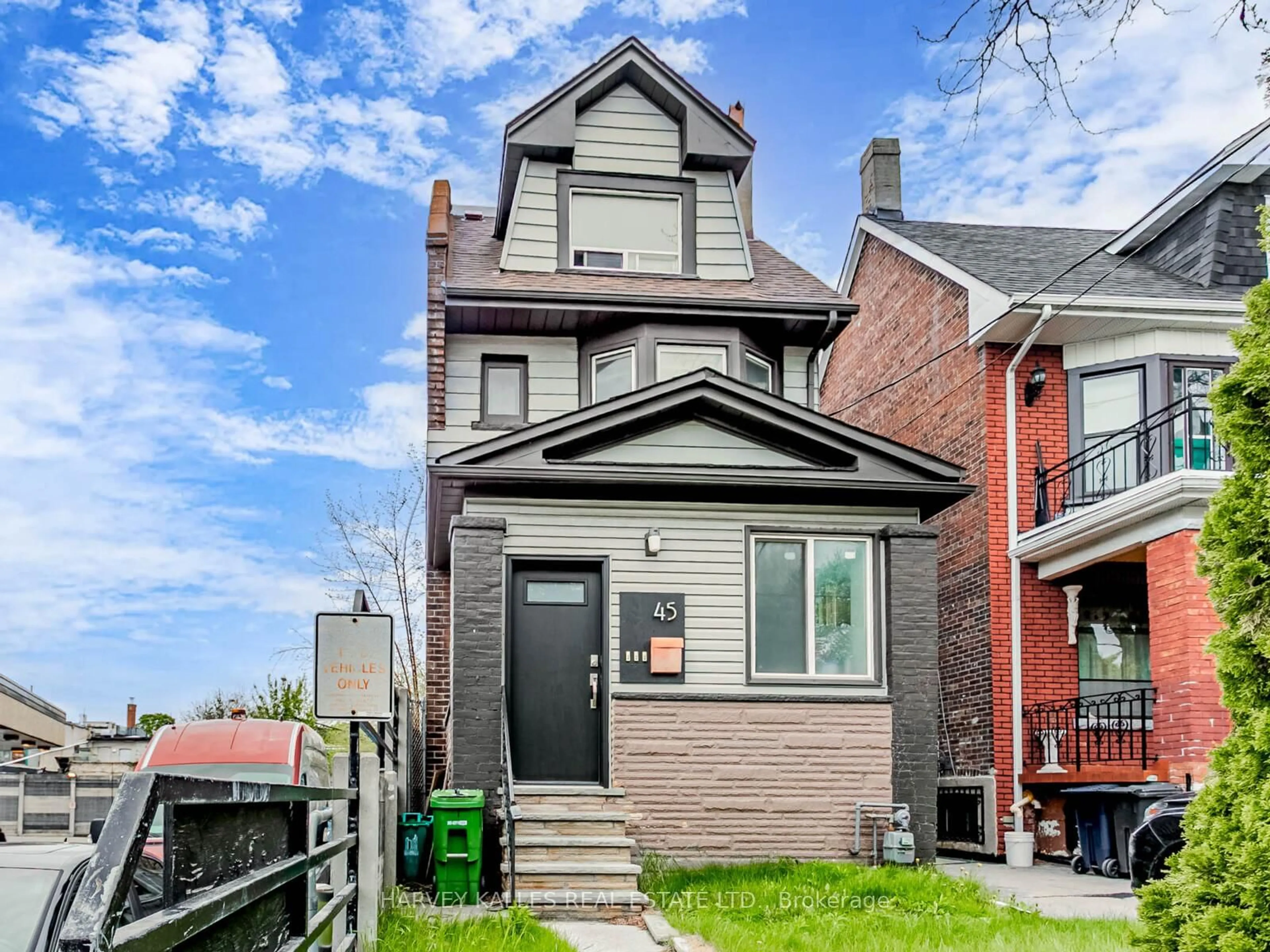 Home with brick exterior material, street for 45 Strathmore Blvd, Toronto Ontario M4C 1N5